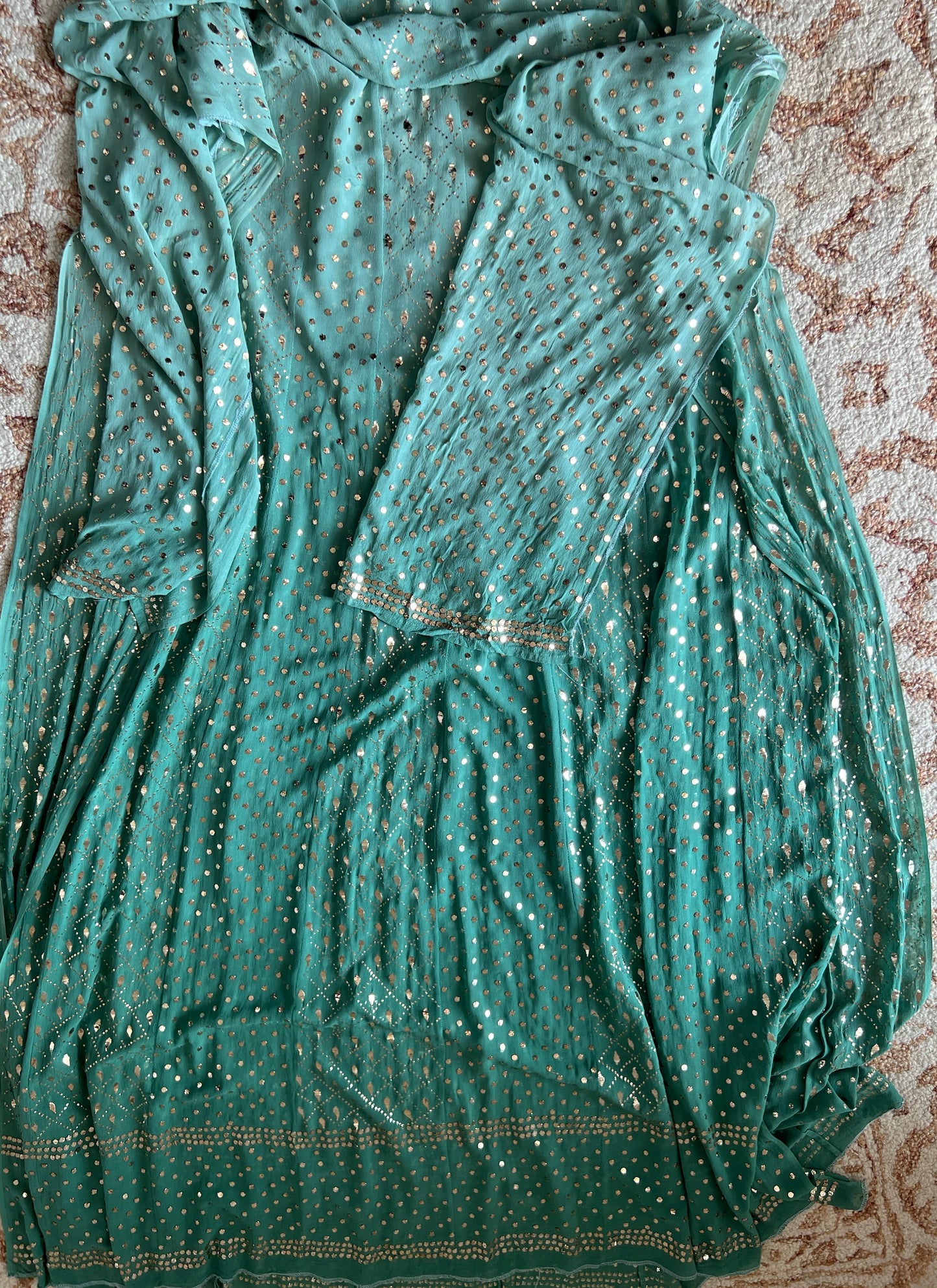 Ruhani Sage green Heavy Mukaish Pure Georgette Anarkali and Dupatta