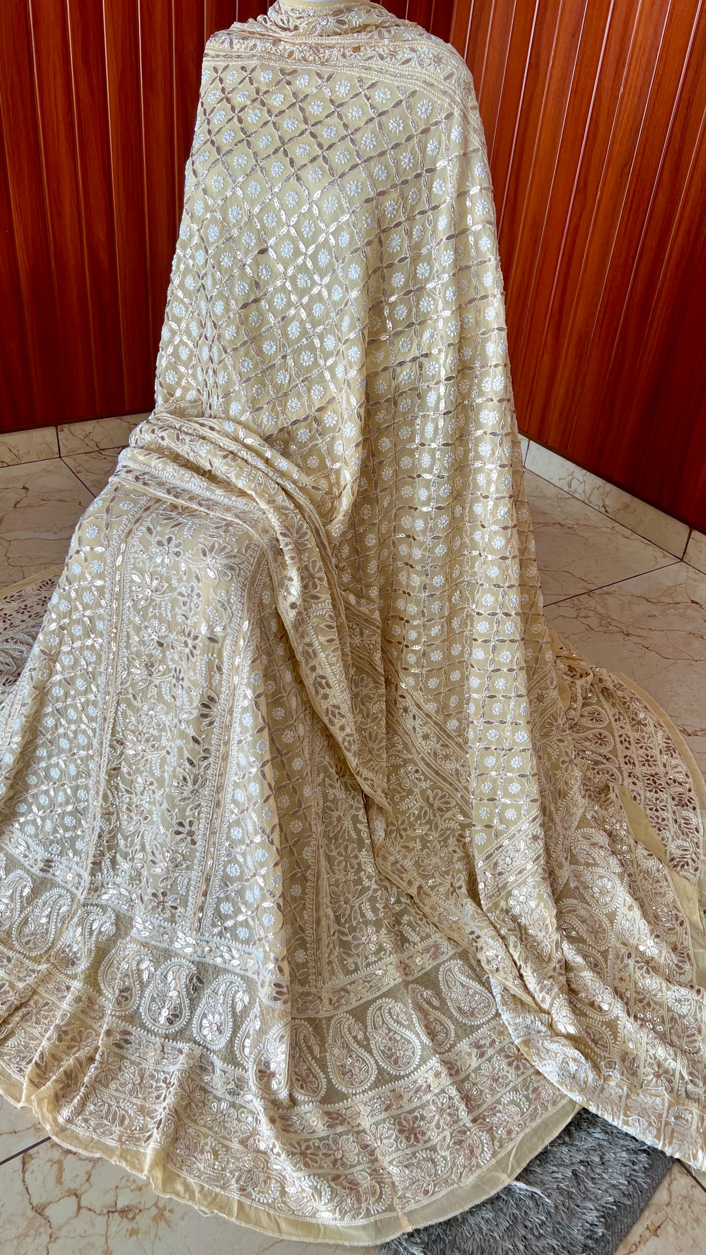 Ruhani Creamish Yellow Chikankari and Gota Patti Pure Georgette Lehenga Set