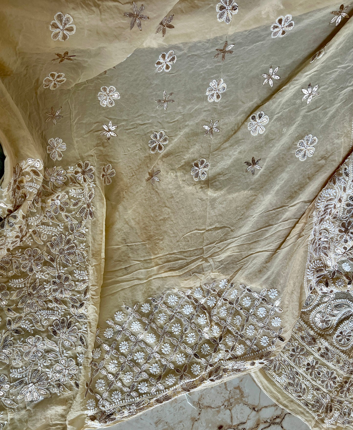 Ruhani Creamish Yellow Chikankari and Gota Patti Pure Georgette Lehenga Set