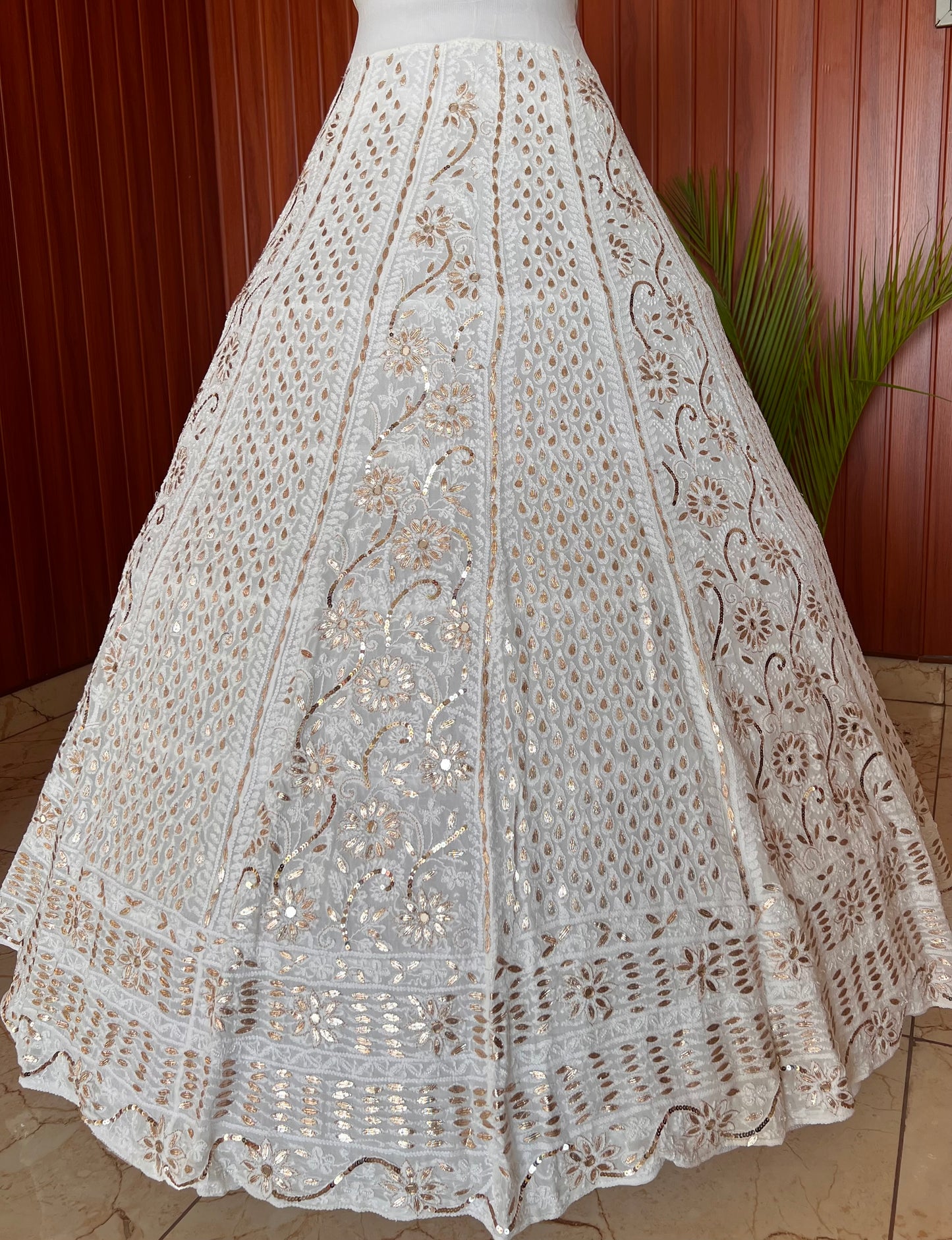 White lehenga skirt with allover Chikankari sequins and gota patti