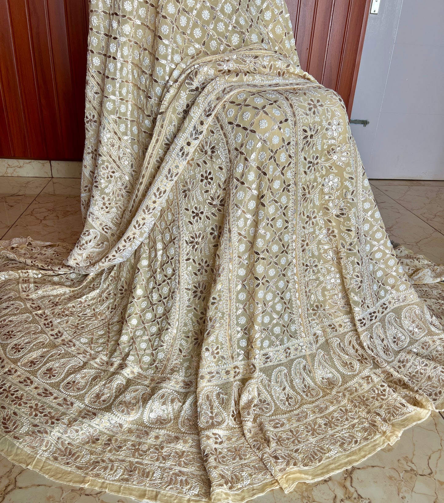 Ruhani Creamish Yellow Chikankari and Gota Patti Pure Georgette Lehenga Set