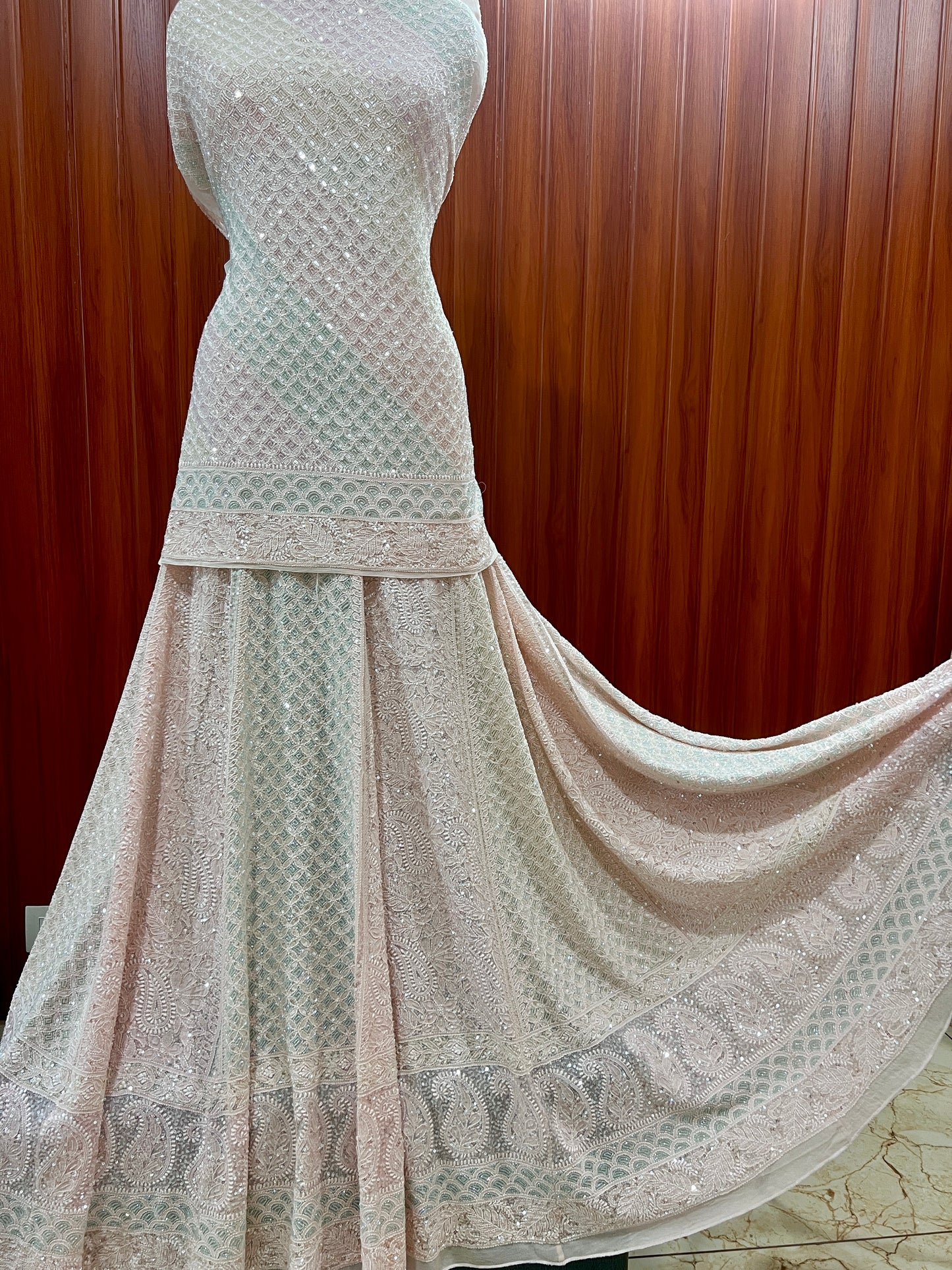 Ruhani Nude Pink Chikankari Lehenga with Multicolored Cut Dana and sequins Work