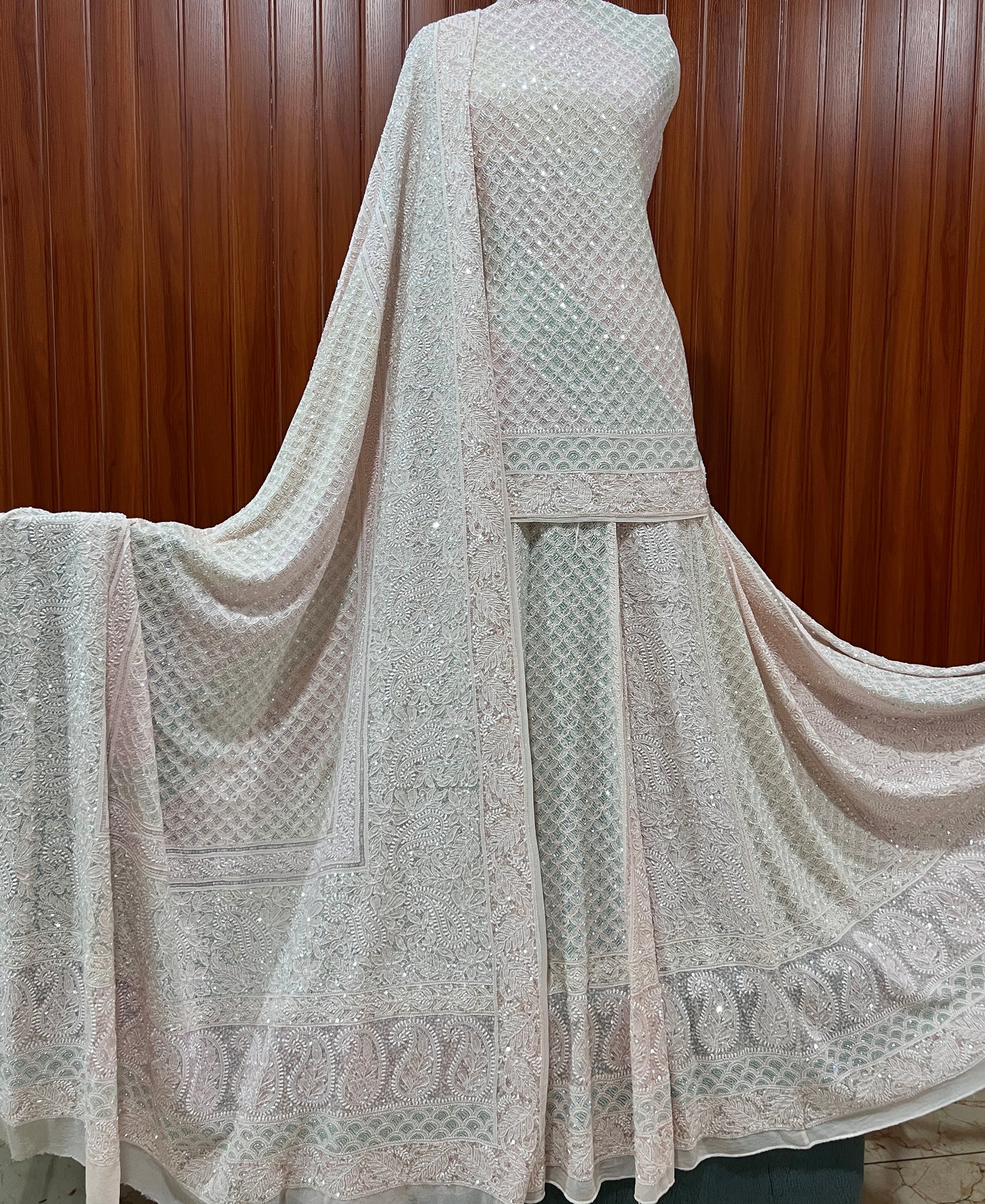 Ruhani Nude Pink Chikankari Lehenga with Multicolored Cut Dana and sequins Work