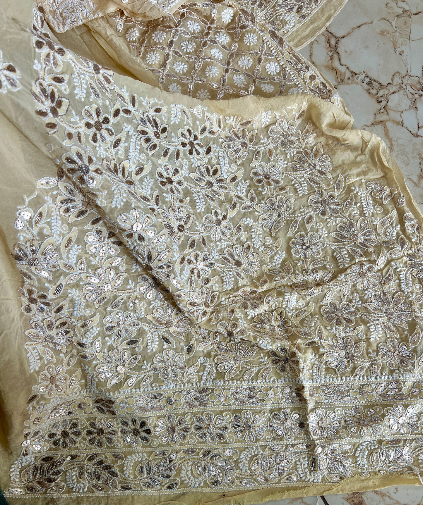 Ruhani Creamish Yellow Chikankari and Gota Patti Pure Georgette Lehenga Set