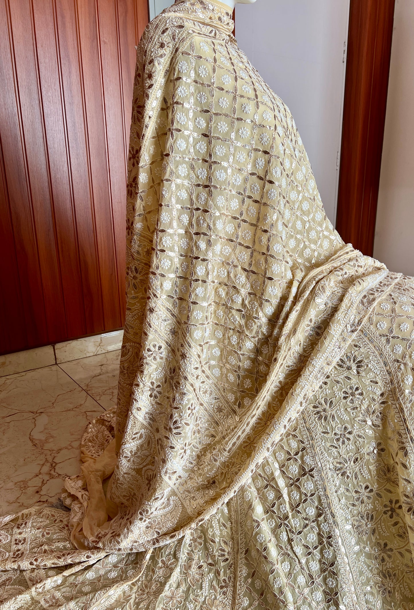 Ruhani Creamish Yellow Chikankari and Gota Patti Pure Georgette Lehenga Set