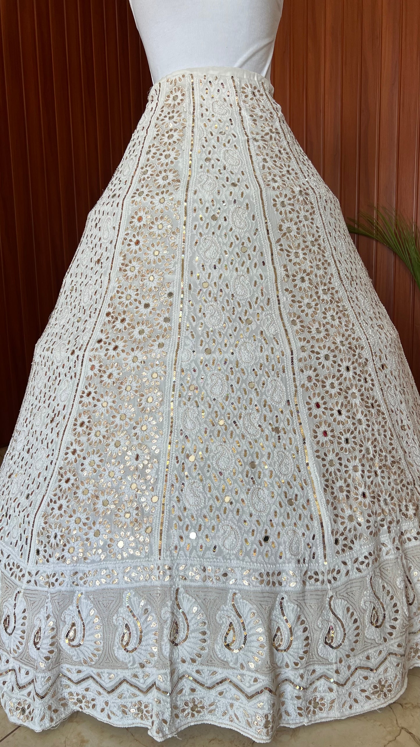 White lehenga skirt with allover Chikankari sequins and gota patti