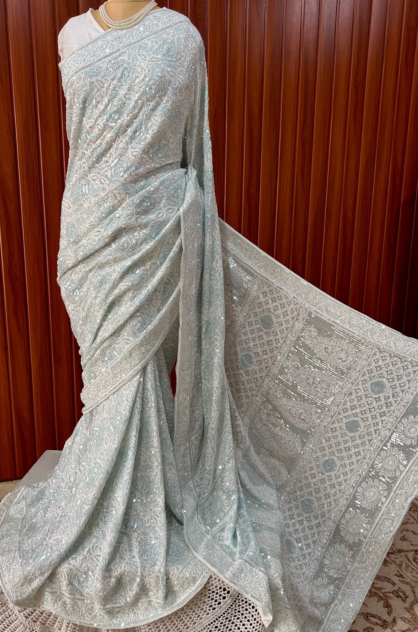 Ruhani light firozi embellished Chikankari hand Embroidered Saree