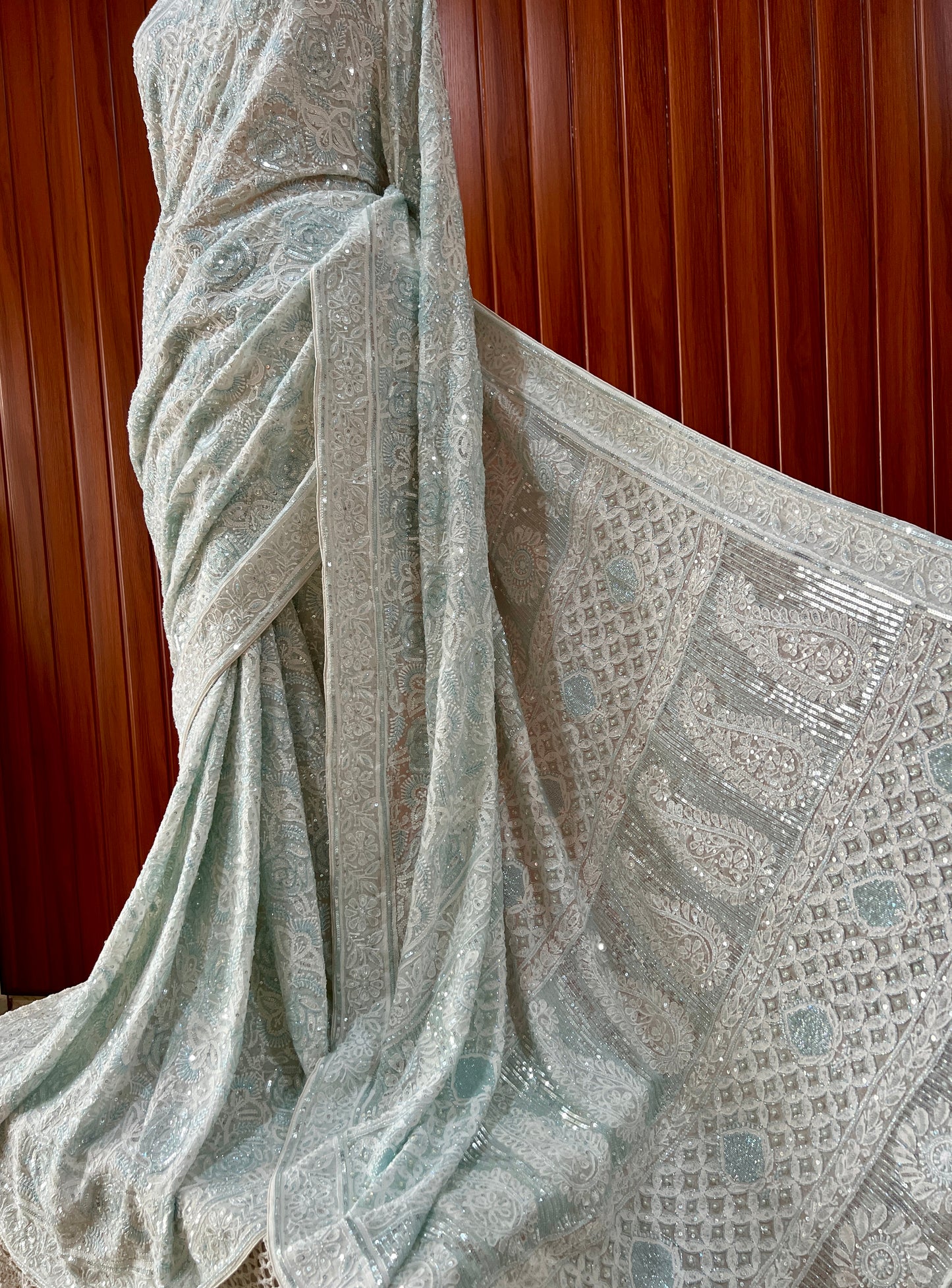Ruhani light firozi embellished Chikankari hand Embroidered Saree