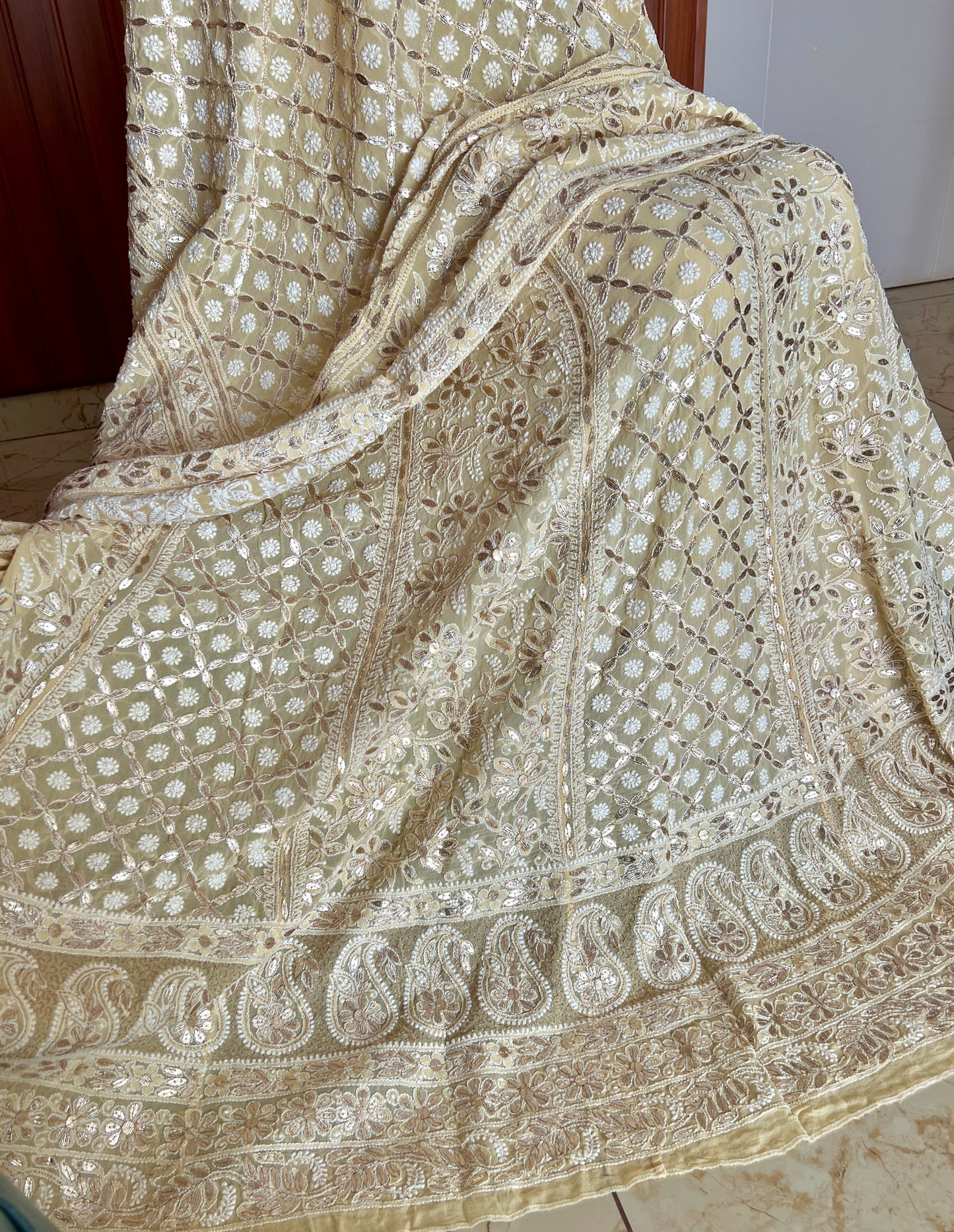 Ruhani Creamish Yellow Chikankari and Gota Patti Pure Georgette Lehenga Set
