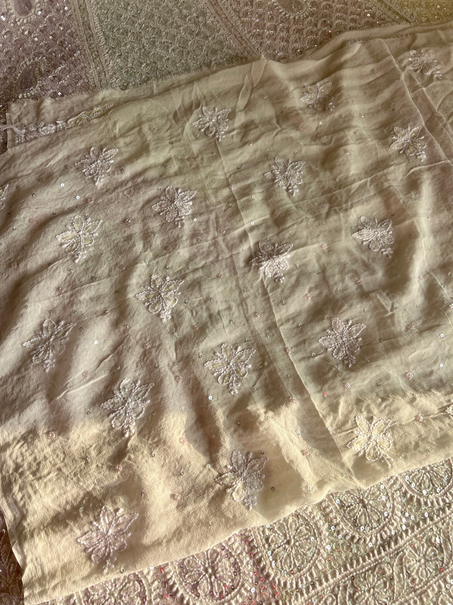 Ruhani Ivory Chikankari Lehenga with Multi Cut Dana and sequins Work