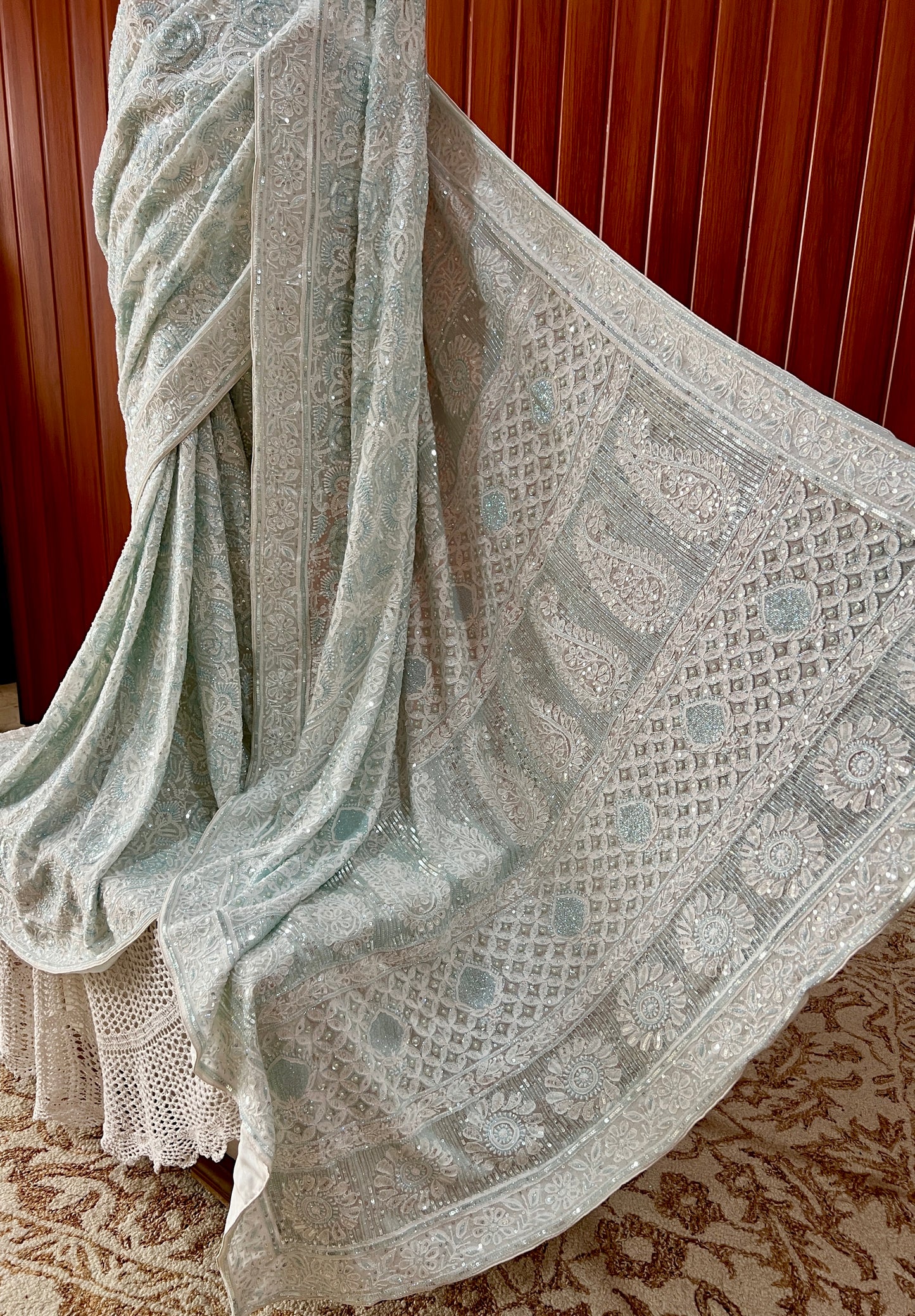 Ruhani light firozi embellished Chikankari hand Embroidered Saree