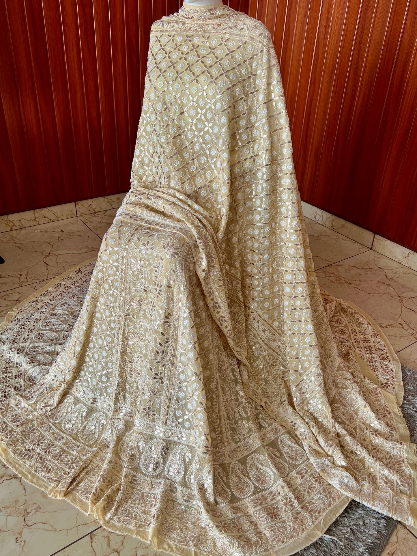 Ruhani Creamish Yellow Chikankari and Gota Patti Pure Georgette Lehenga Set