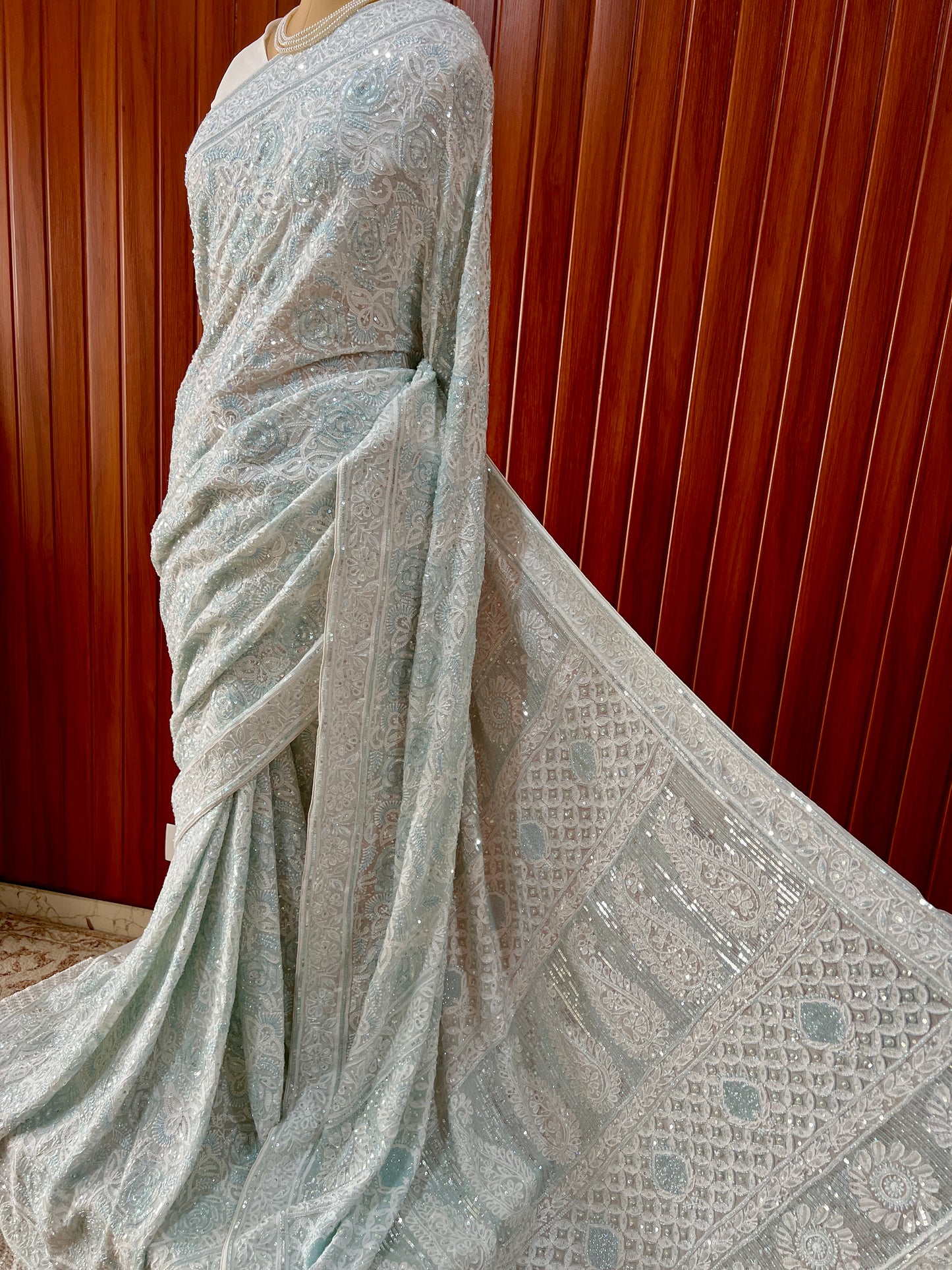Ruhani light firozi embellished Chikankari hand Embroidered Saree