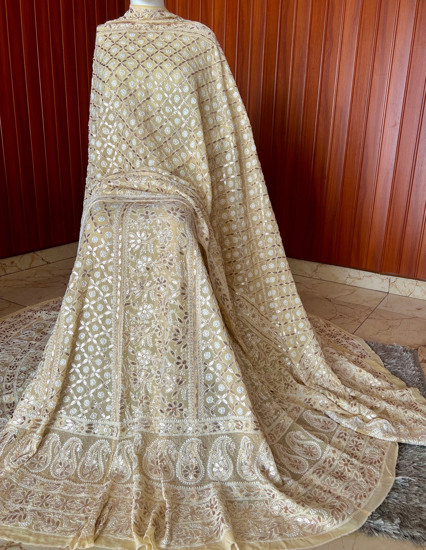 Ruhani Creamish Yellow Chikankari and Gota Patti Pure Georgette Lehenga Set