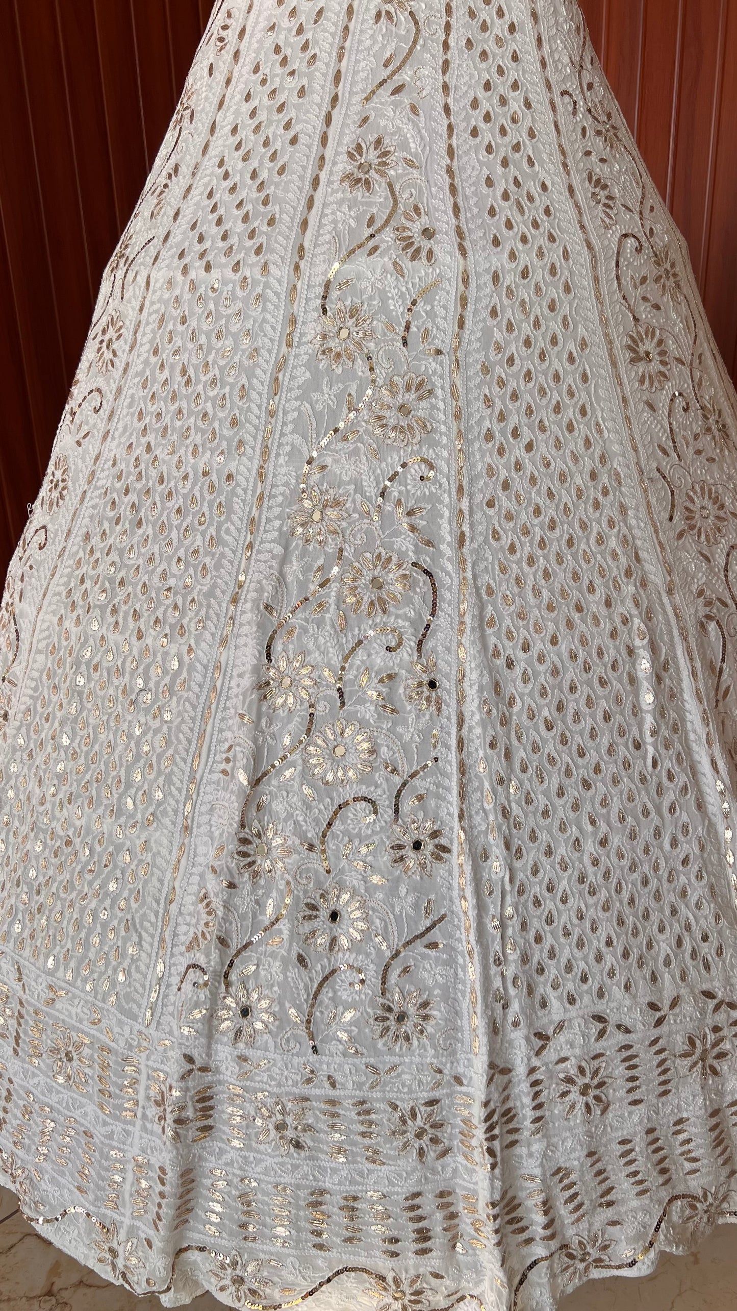 White lehenga skirt with allover Chikankari sequins and gota patti