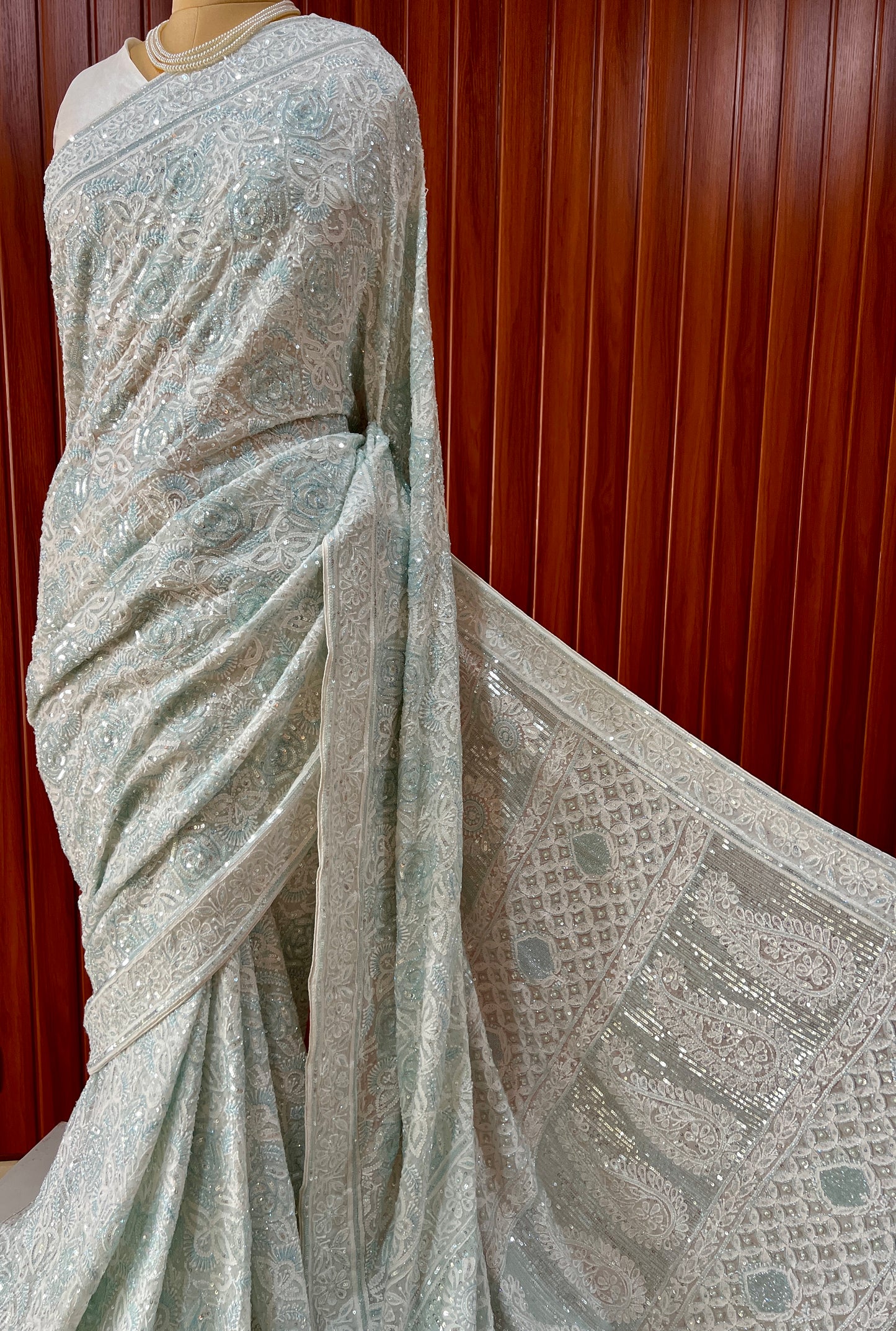 Ruhani light firozi embellished Chikankari hand Embroidered Saree