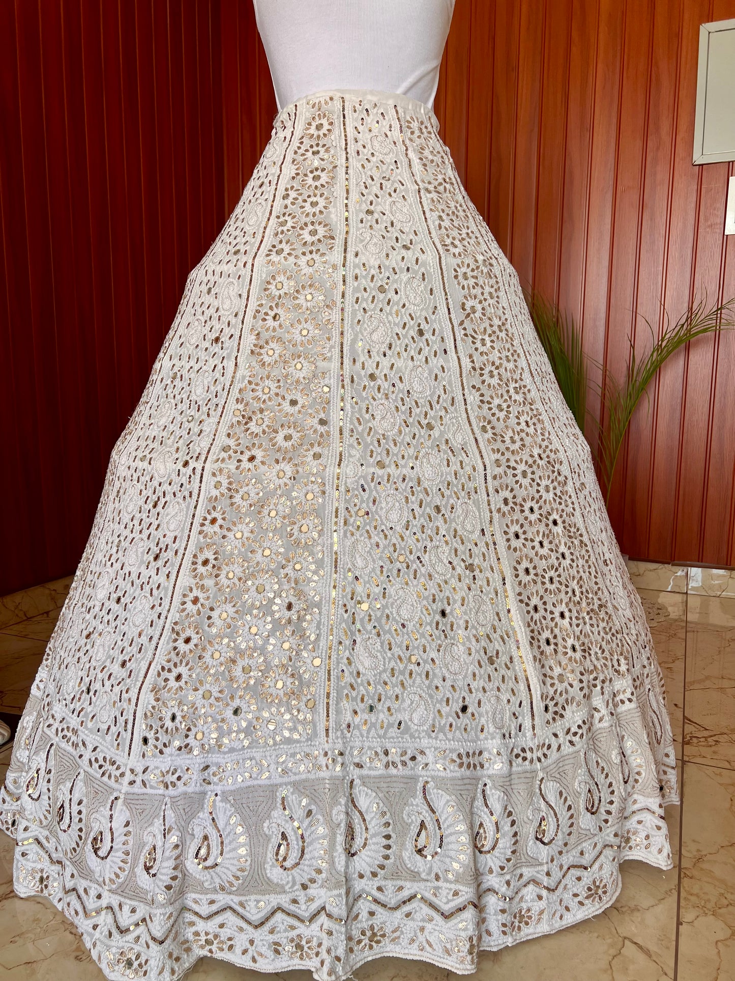 White lehenga skirt with allover Chikankari sequins and gota patti