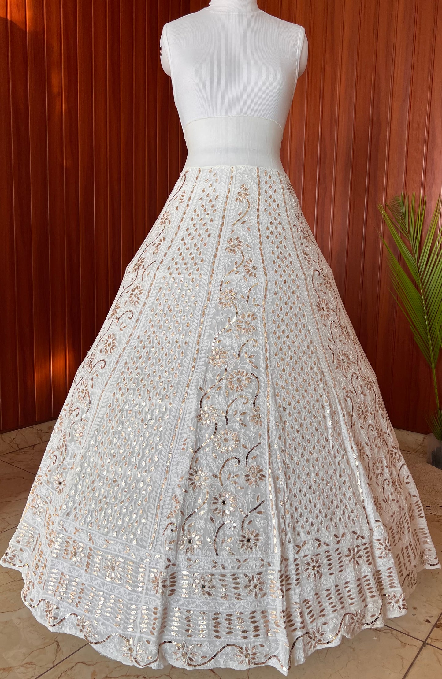 White lehenga skirt with allover Chikankari sequins and gota patti