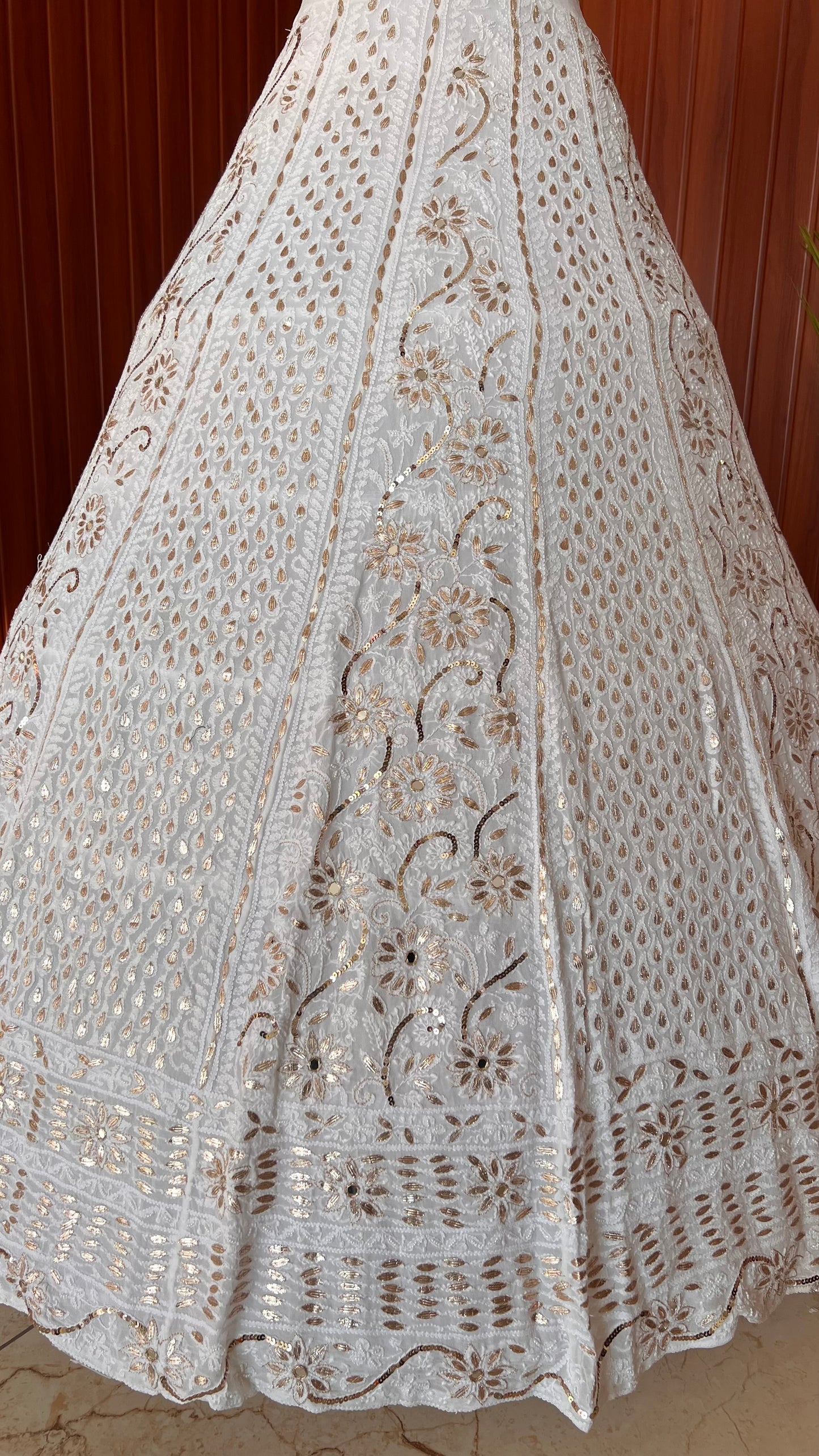 White lehenga skirt with allover Chikankari sequins and gota patti