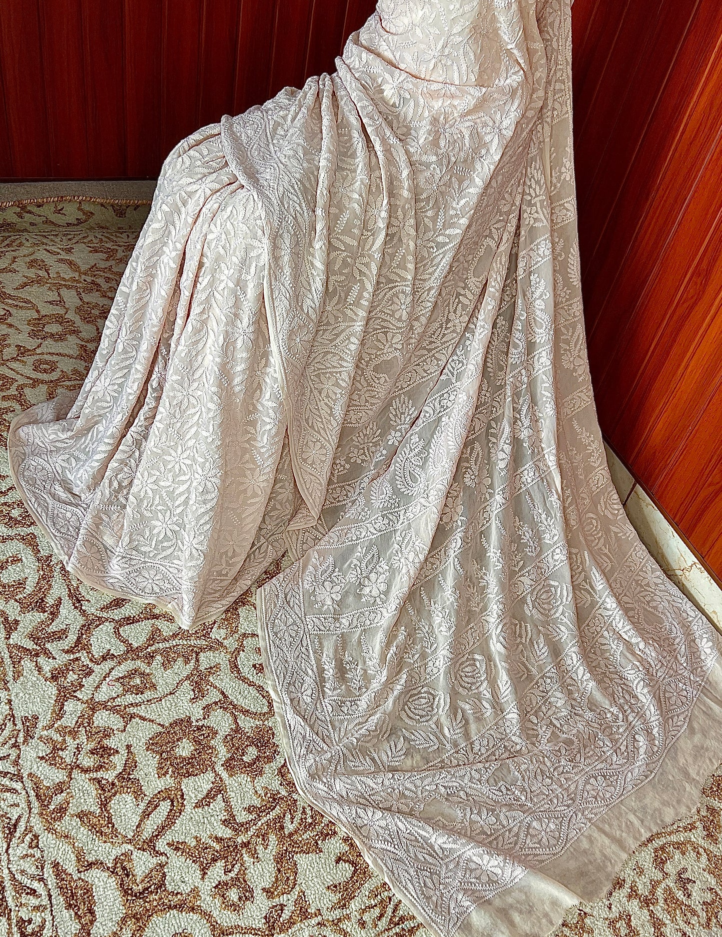 Ruhani nude peach fine Chikankari Hand Embroidered Saree