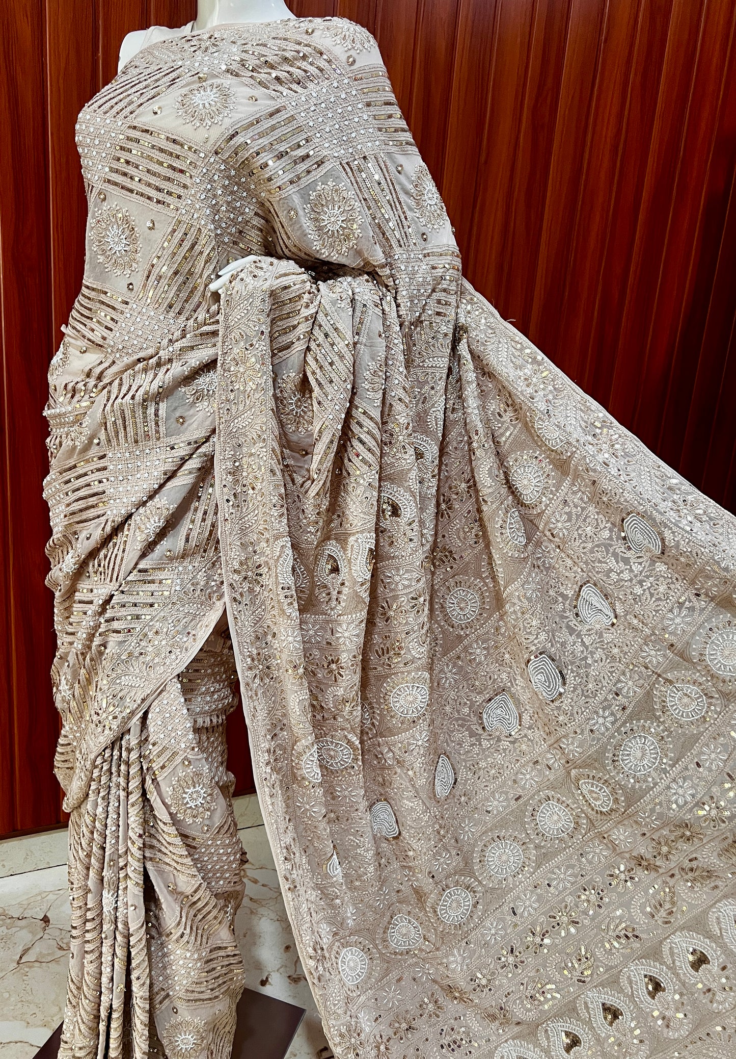 Ruhani Powder brown Chikankari Saree with Sequins Pearl and Aari Embroidery