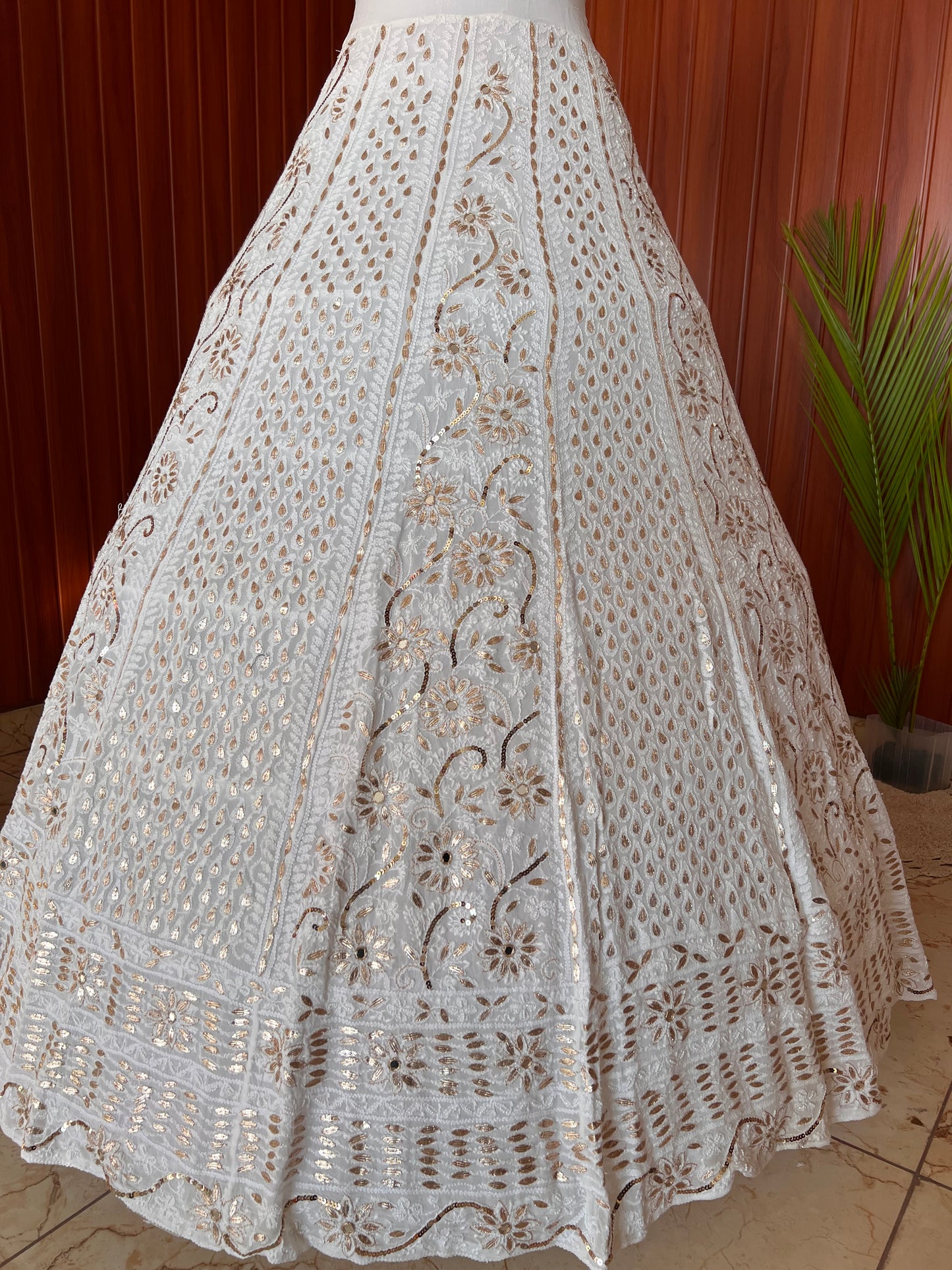 White lehenga skirt with allover Chikankari sequins and gota patti