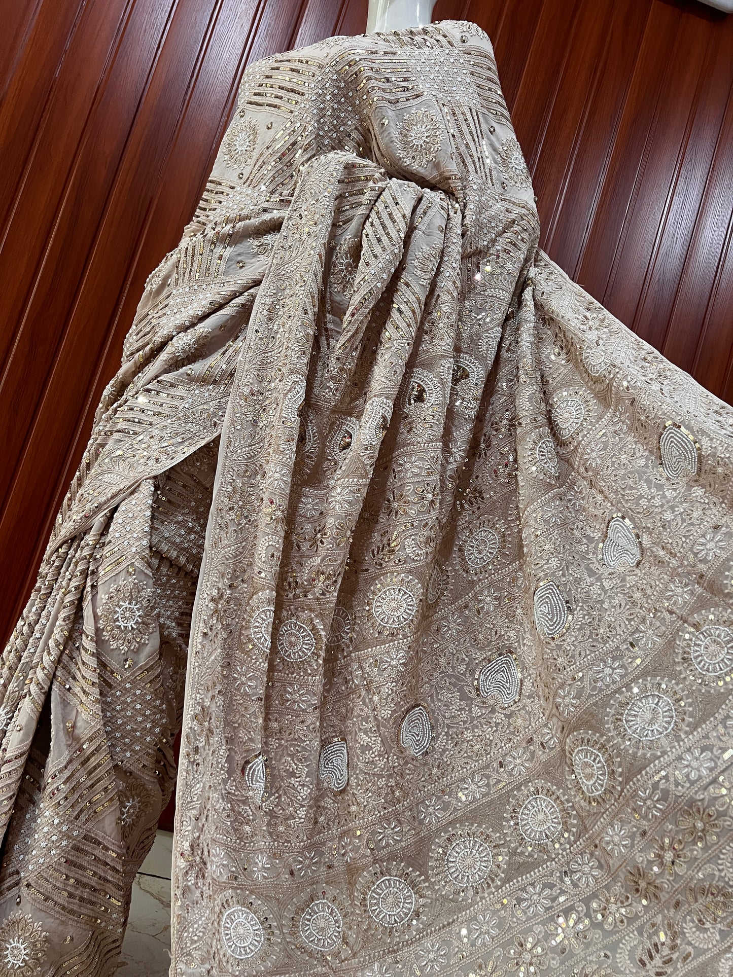 Ruhani Powder brown Chikankari Saree with Sequins Pearl and Aari Embroidery
