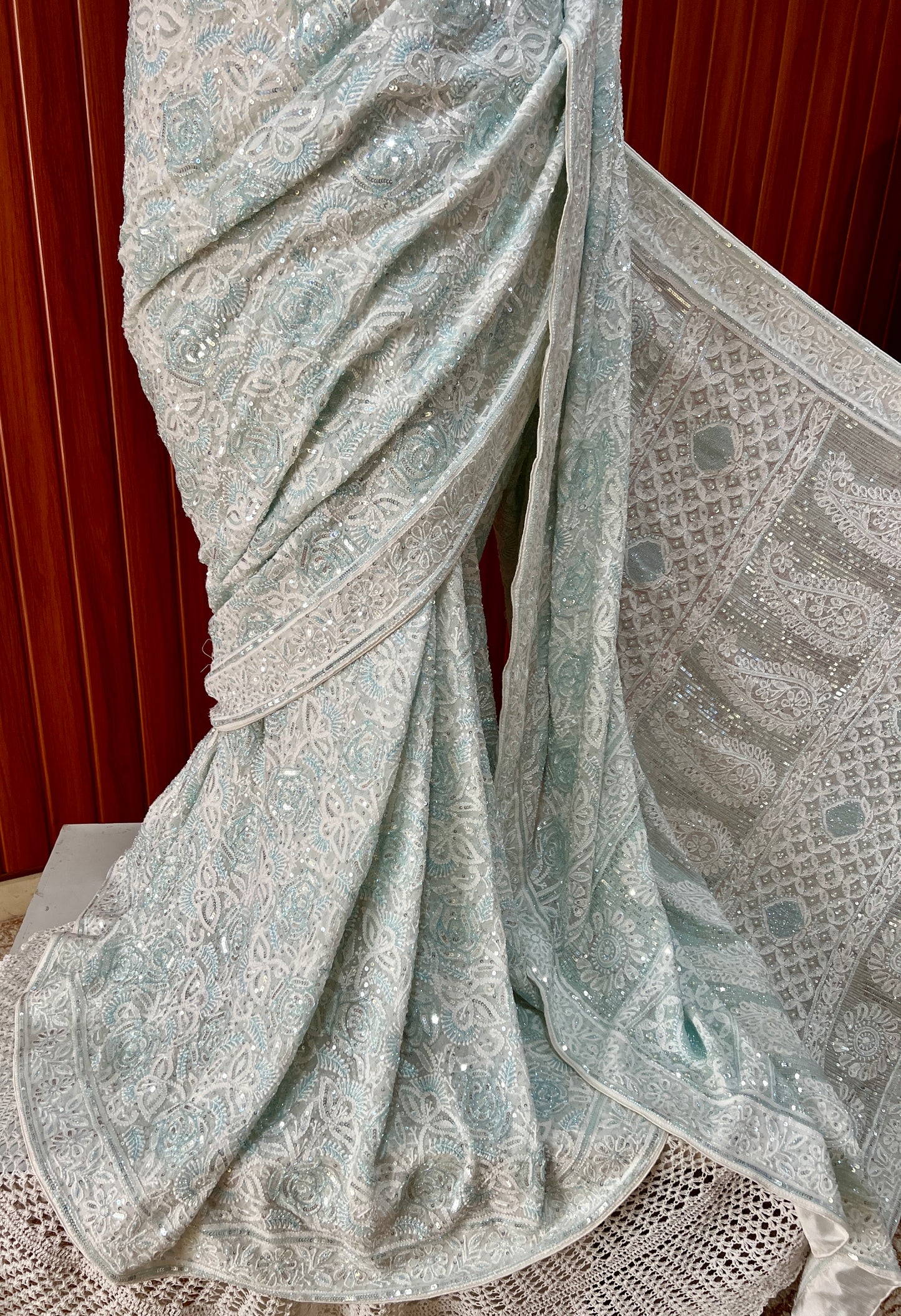 Ruhani light firozi embellished Chikankari hand Embroidered Saree