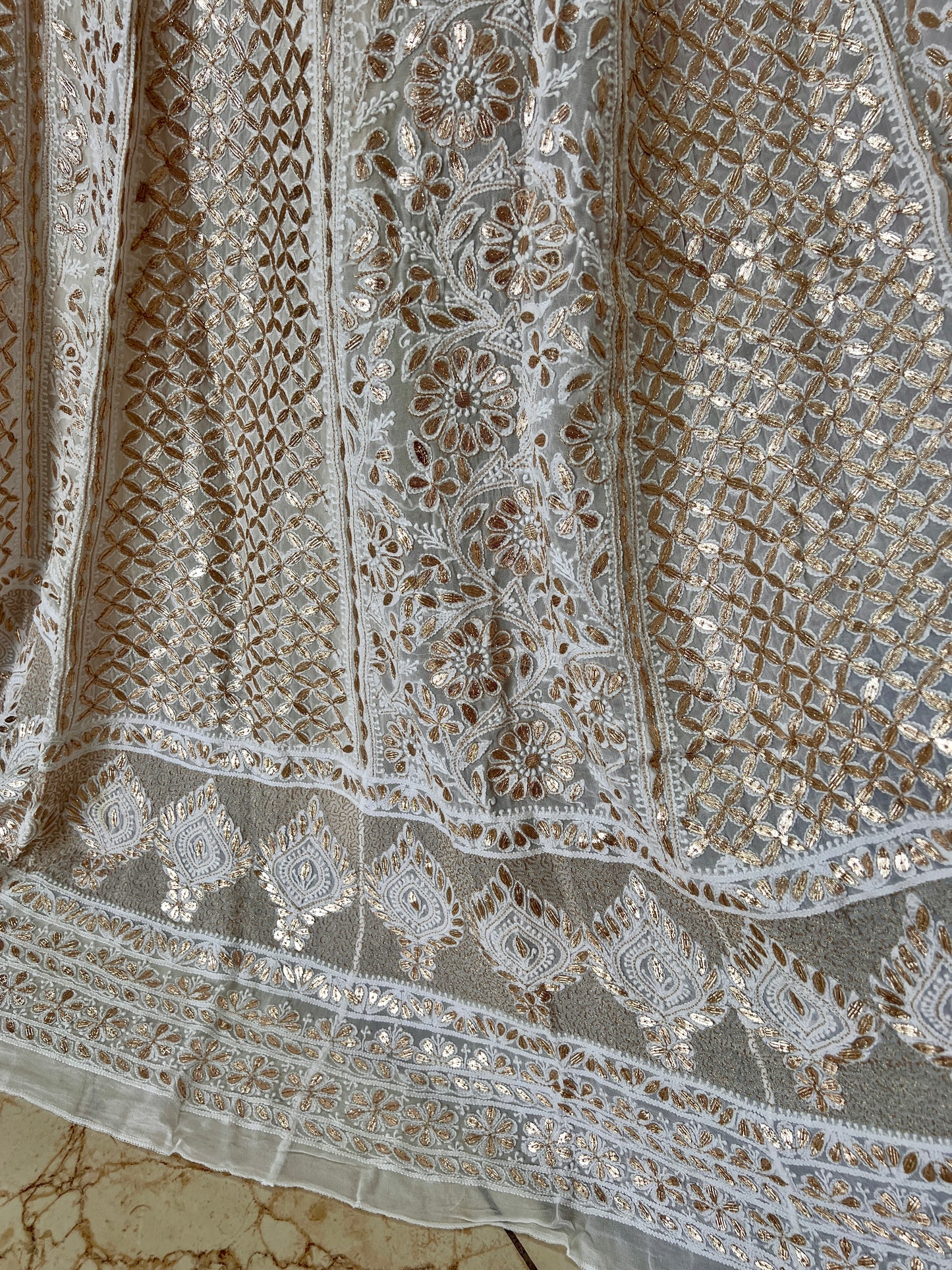 Off White designer lehenga skirt with allover Chikankari and heavy gota patti Lehenga skirt