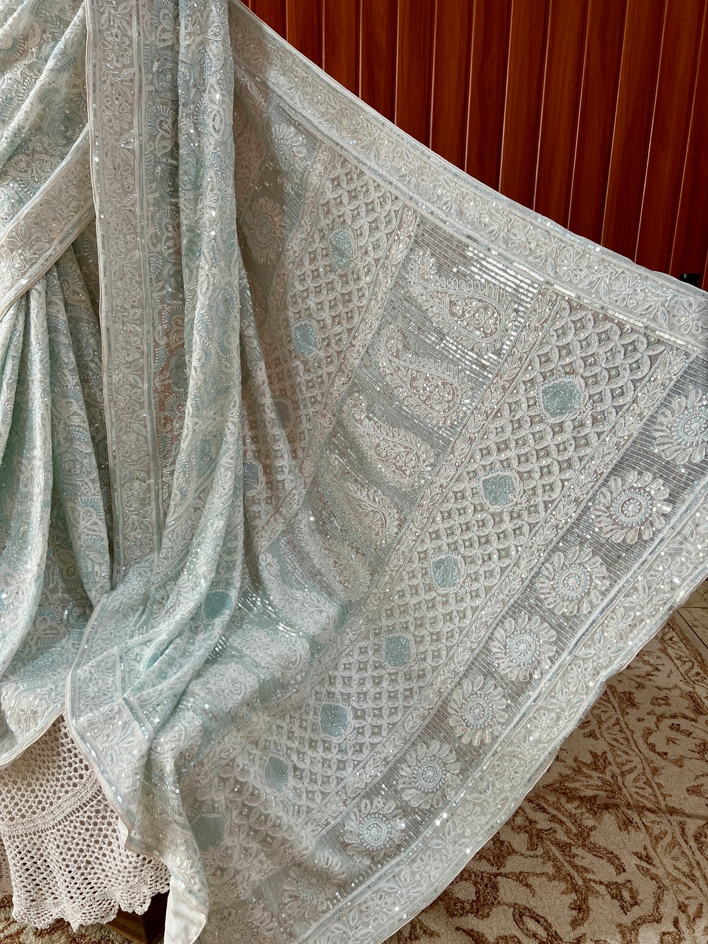 Ruhani light firozi embellished Chikankari hand Embroidered Saree