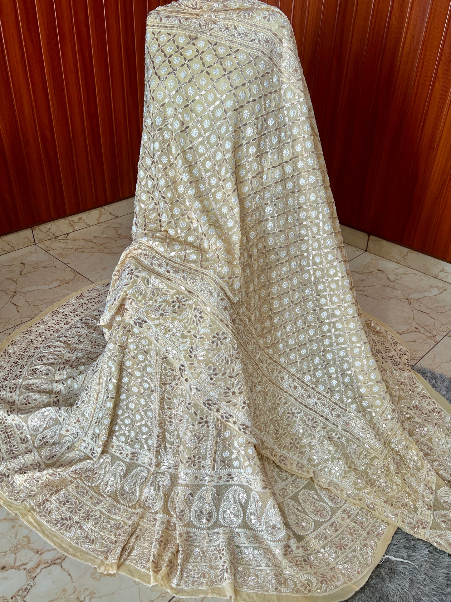 Ruhani Creamish Yellow Chikankari and Gota Patti Pure Georgette Lehenga Set