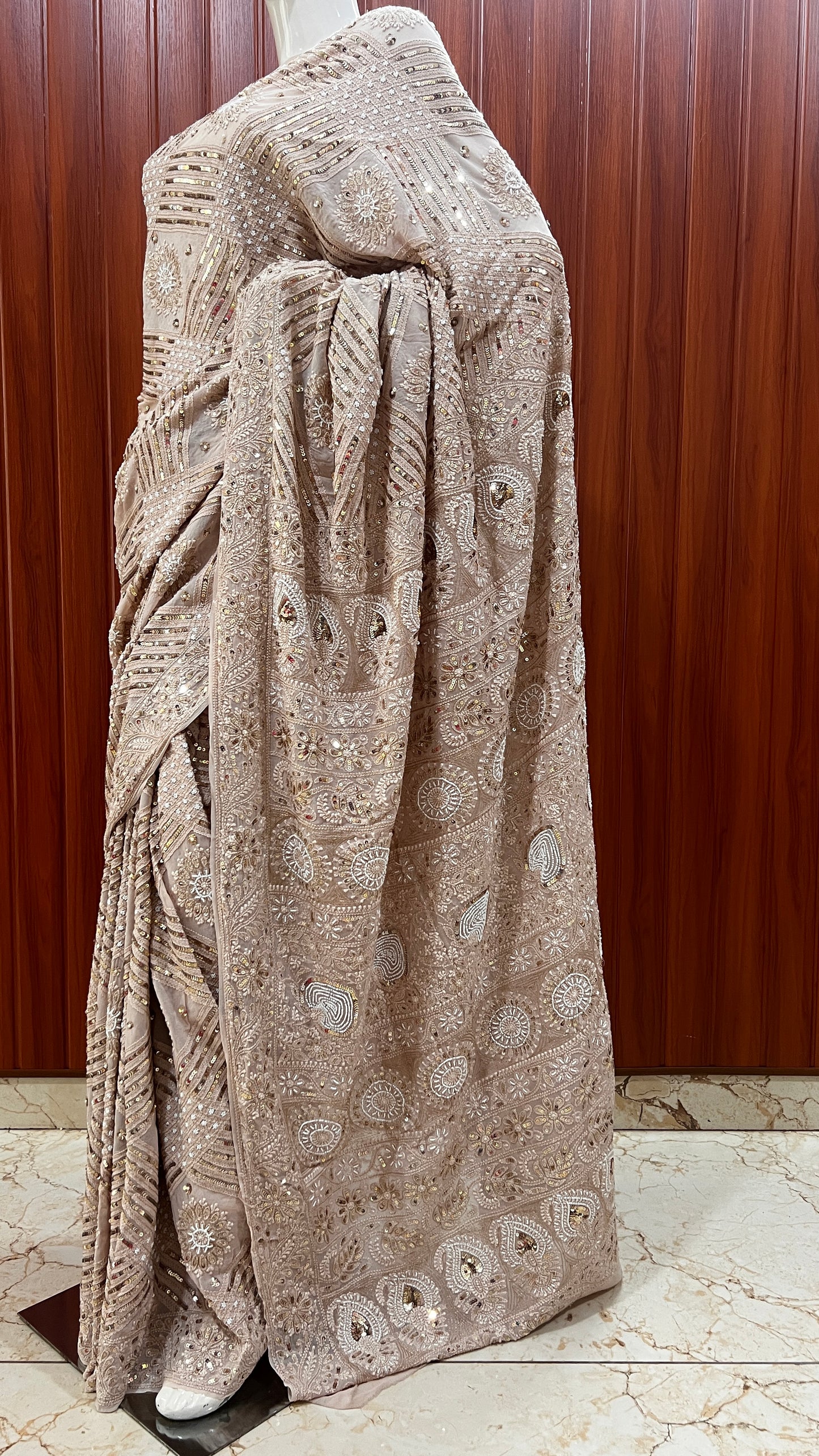 Ruhani Powder brown Chikankari Saree with Sequins Pearl and Aari Embroidery