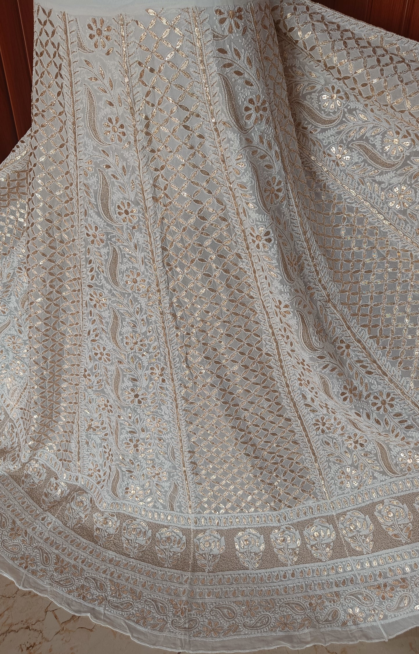 White designer lehenga skirt with allover Chikankari and heavy gota patti Lehenga skirt