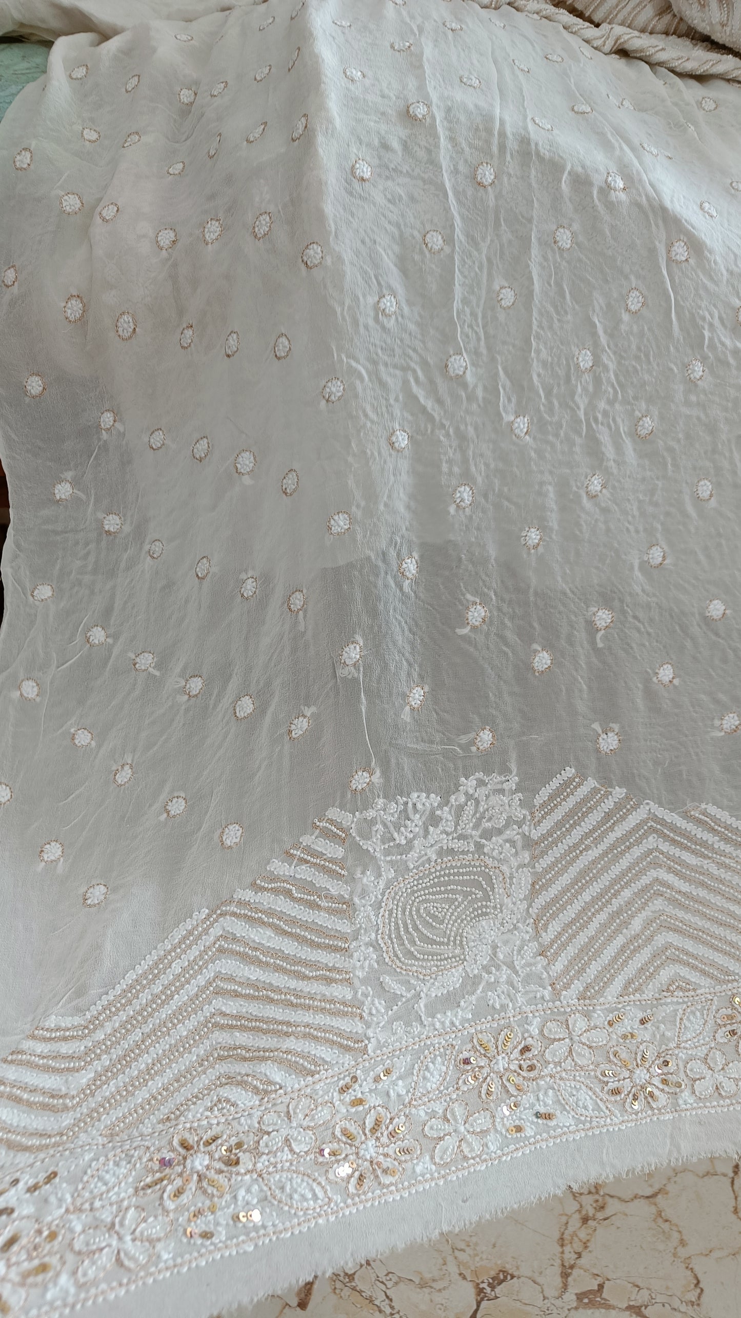 Ruhani Ivory Chikankari Saree with heavy Sequins Pearl and Aari Embroidery