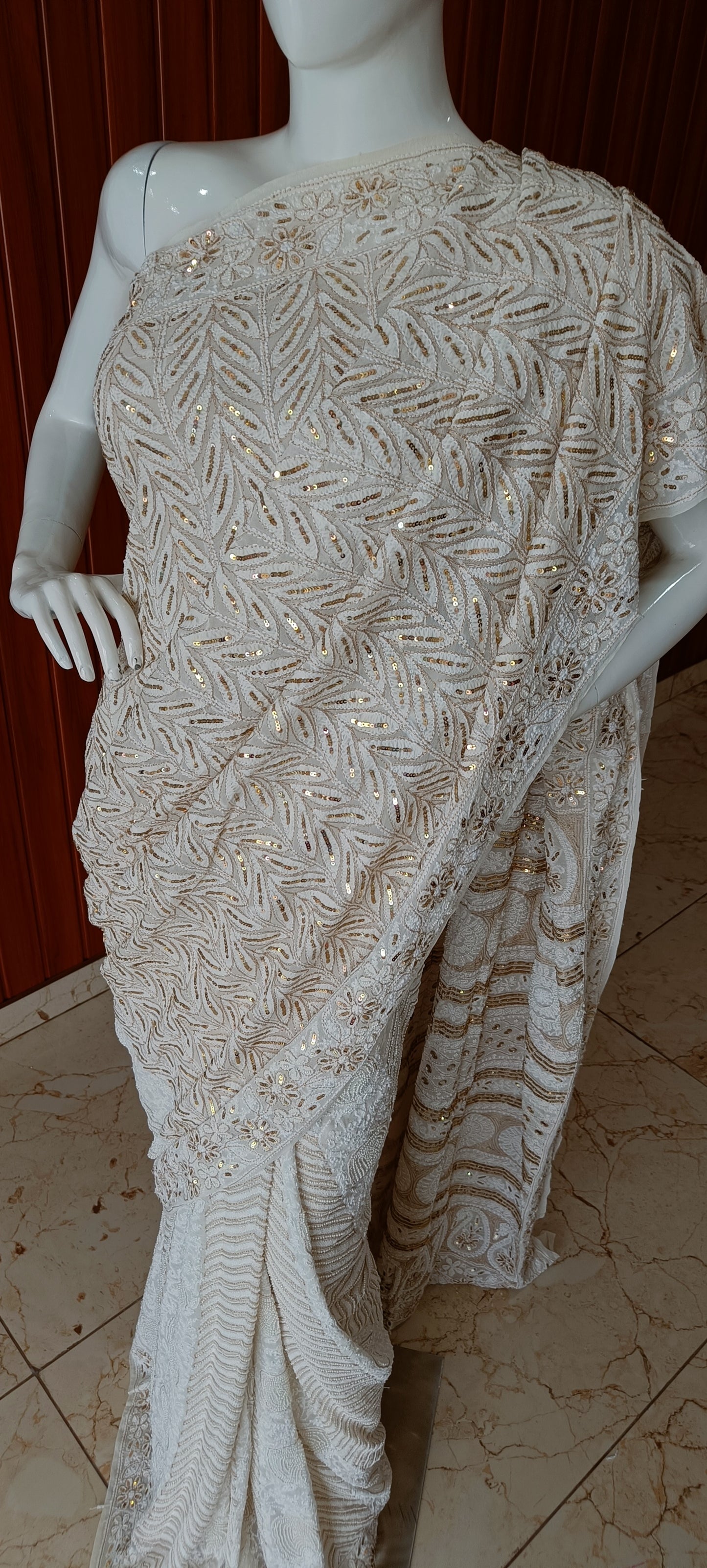Ruhani Ivory Chikankari Saree with heavy Sequins Pearl and Aari Embroidery