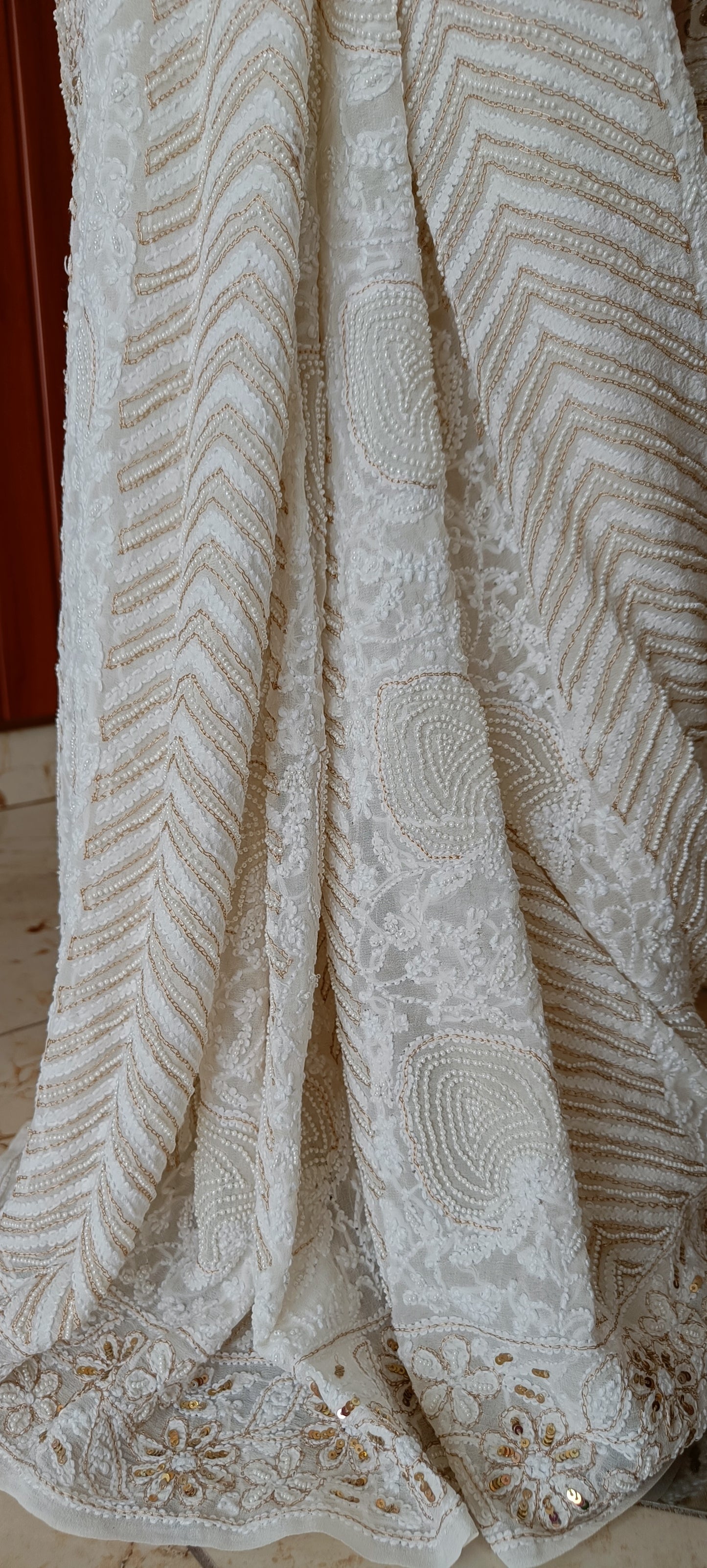 Ruhani Ivory Chikankari Saree with heavy Sequins Pearl and Aari Embroidery