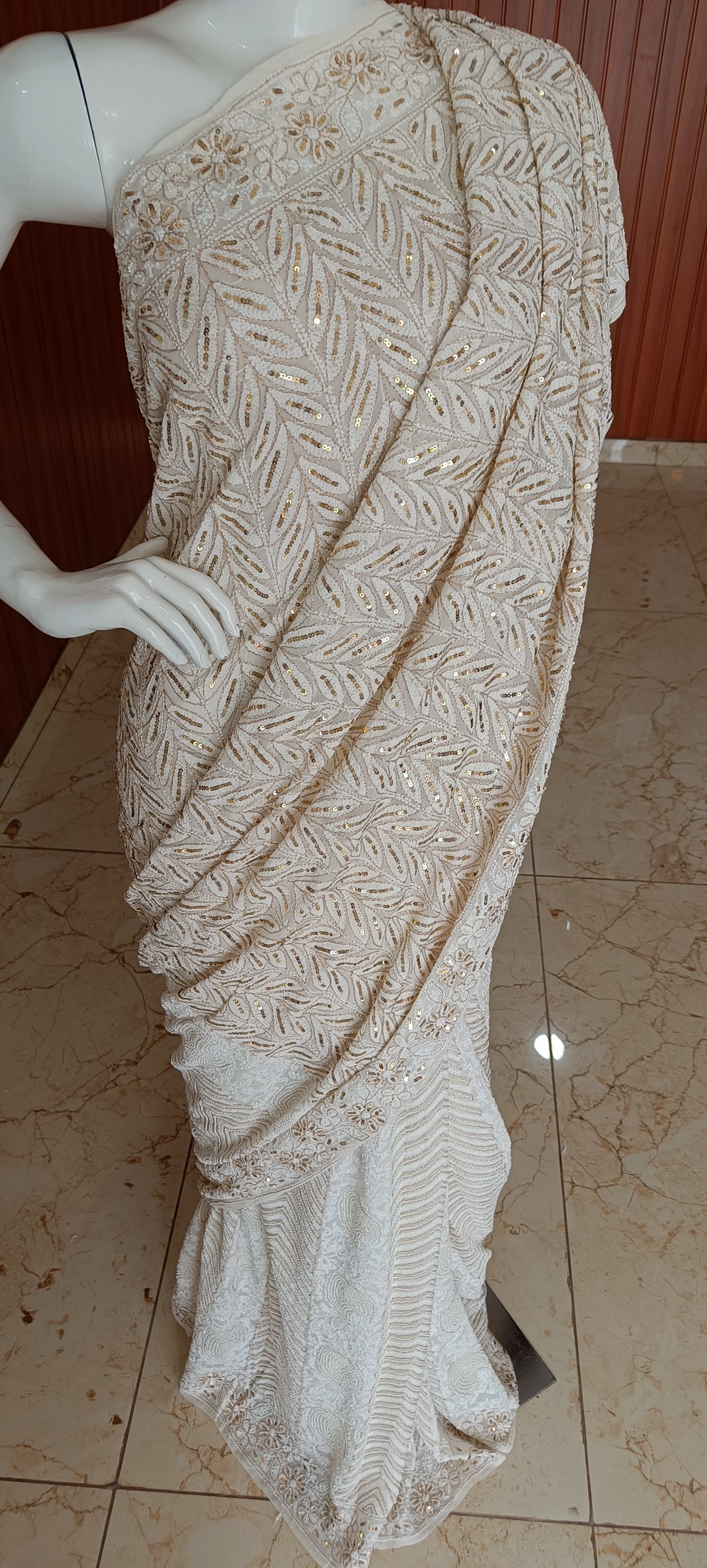 Ruhani Ivory Chikankari Saree with heavy Sequins Pearl and Aari Embroidery
