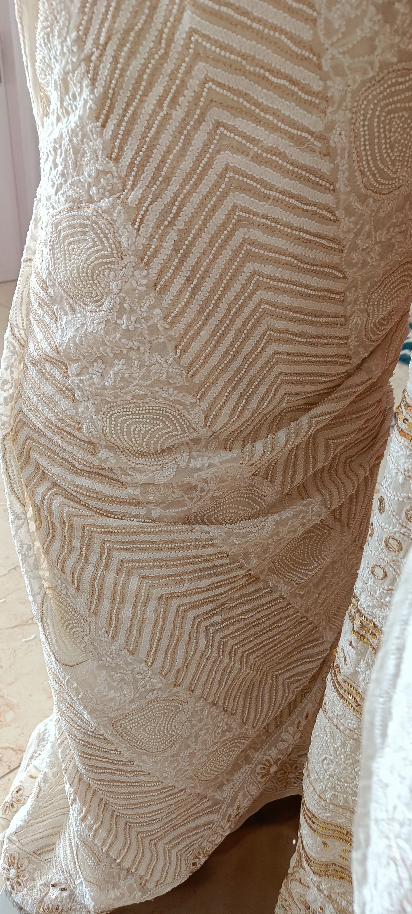 Ruhani Ivory Chikankari Saree with heavy Sequins Pearl and Aari Embroidery