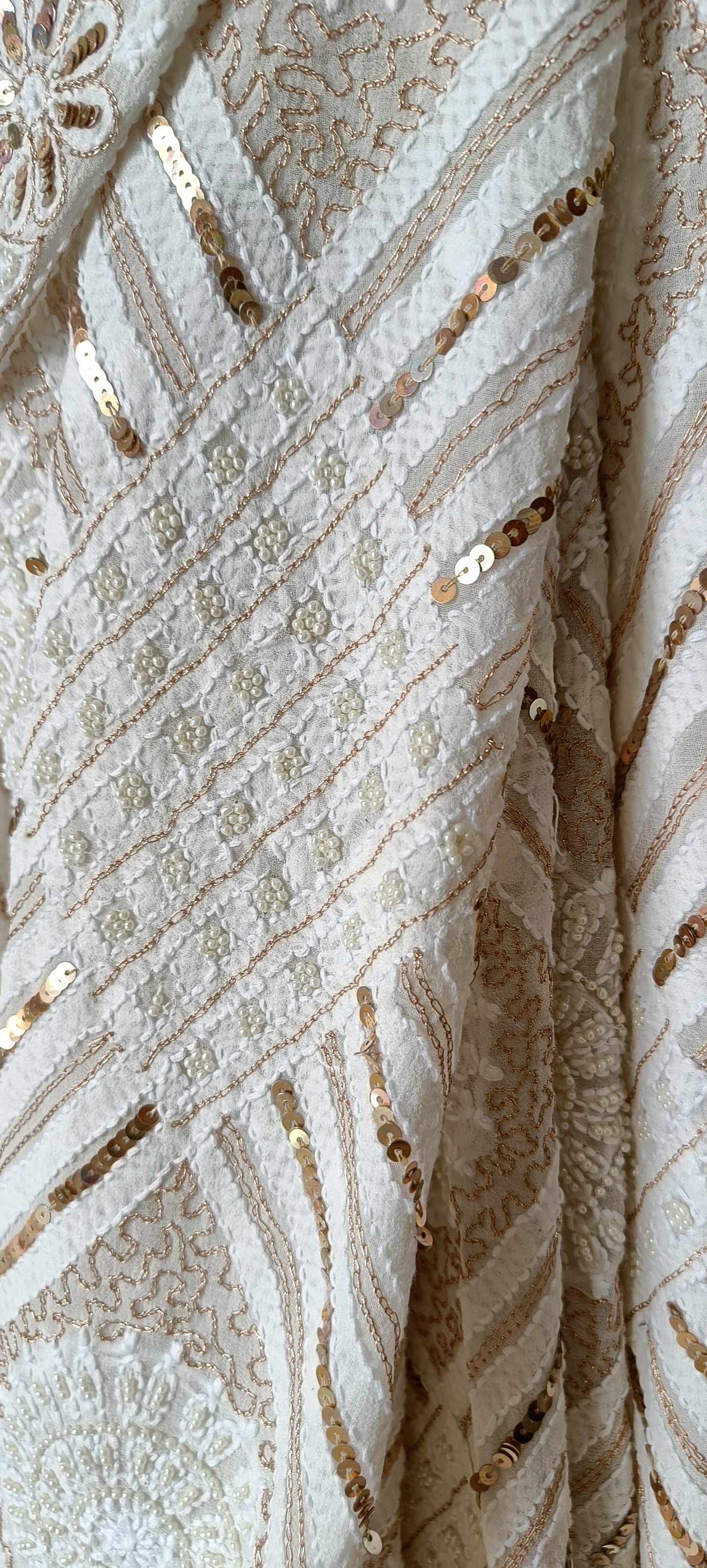 Ruhani Ivory Chikankari Saree with heavy Sequins Pearl and Aari Embroidery