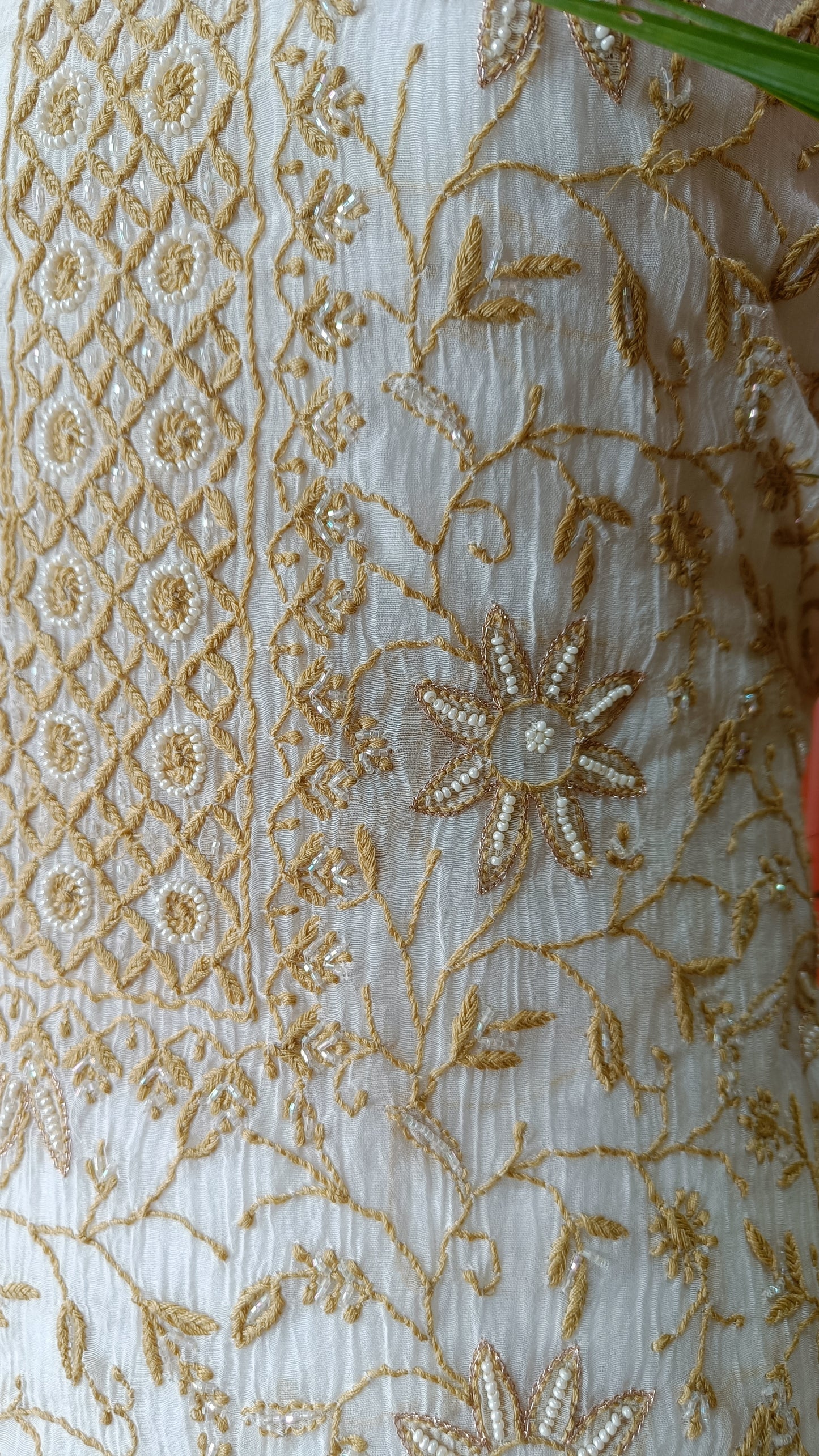 Off White and Mustard Mulmul Chanderi fine Chikankari and Pearl Embroidered Suit