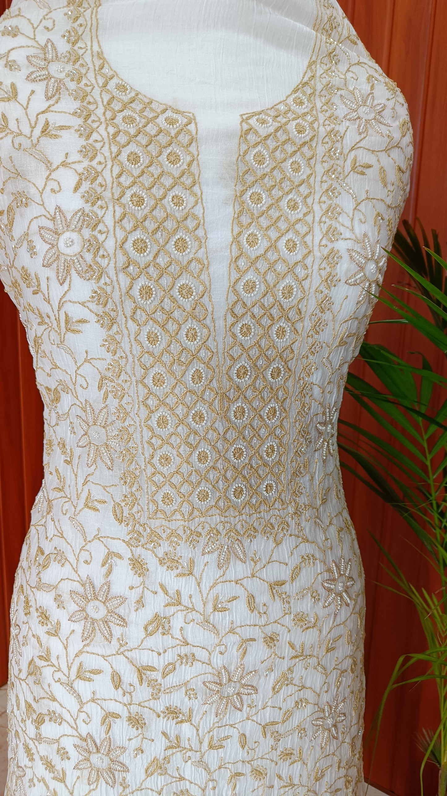 Off White and Mustard Mulmul Chanderi fine Chikankari and Pearl Embroidered Suit