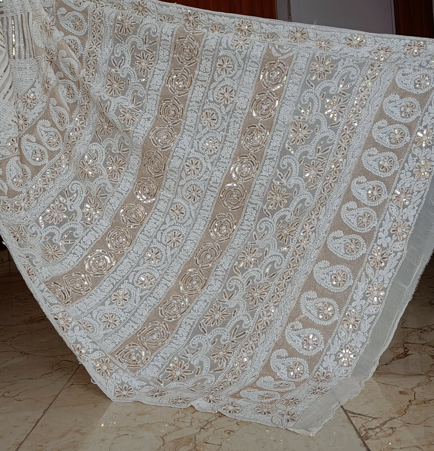 Ruhani Ivory Chikankari Saree with heavy Sequins Pearl and Aari Embroidery