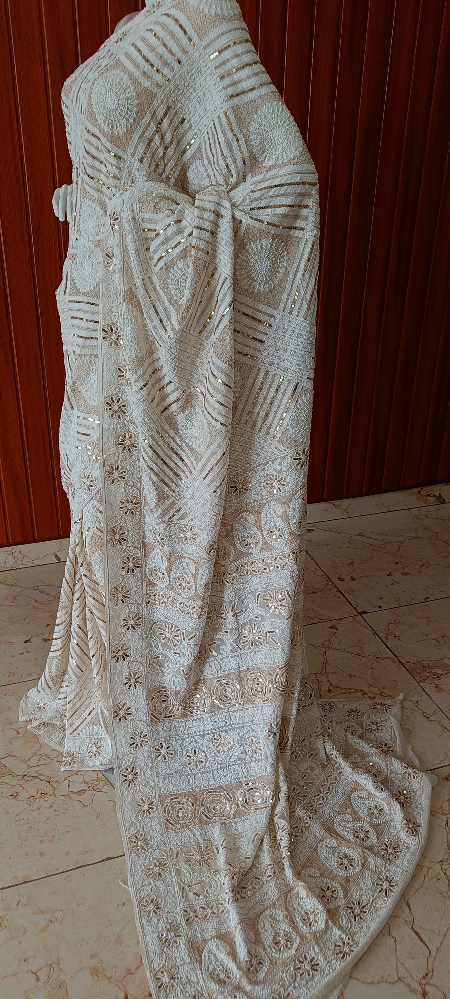 Ruhani Ivory Chikankari Saree with heavy Sequins Pearl and Aari Embroidery