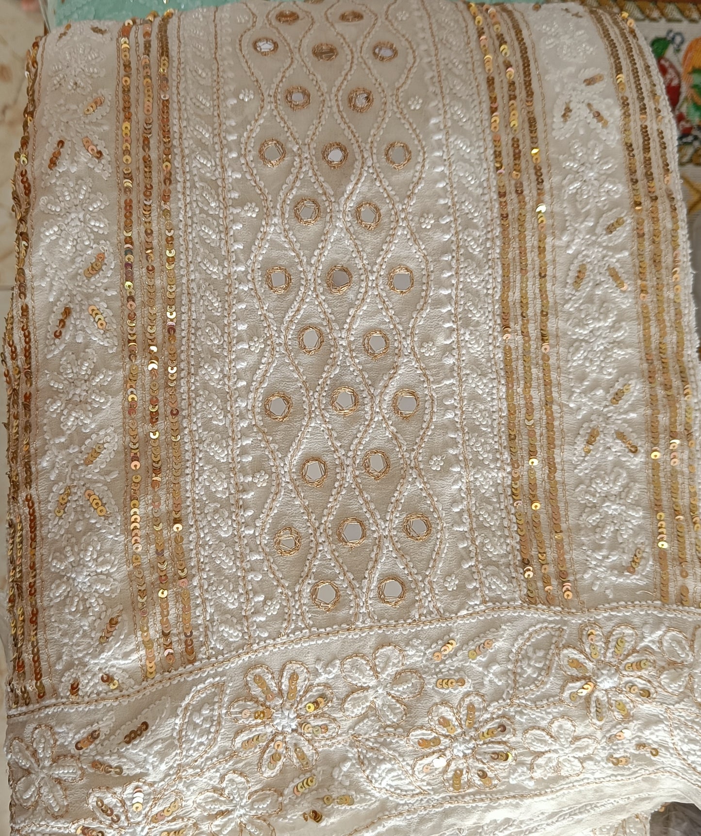 Ruhani Ivory Chikankari Saree with heavy Sequins Pearl and Aari Embroidery