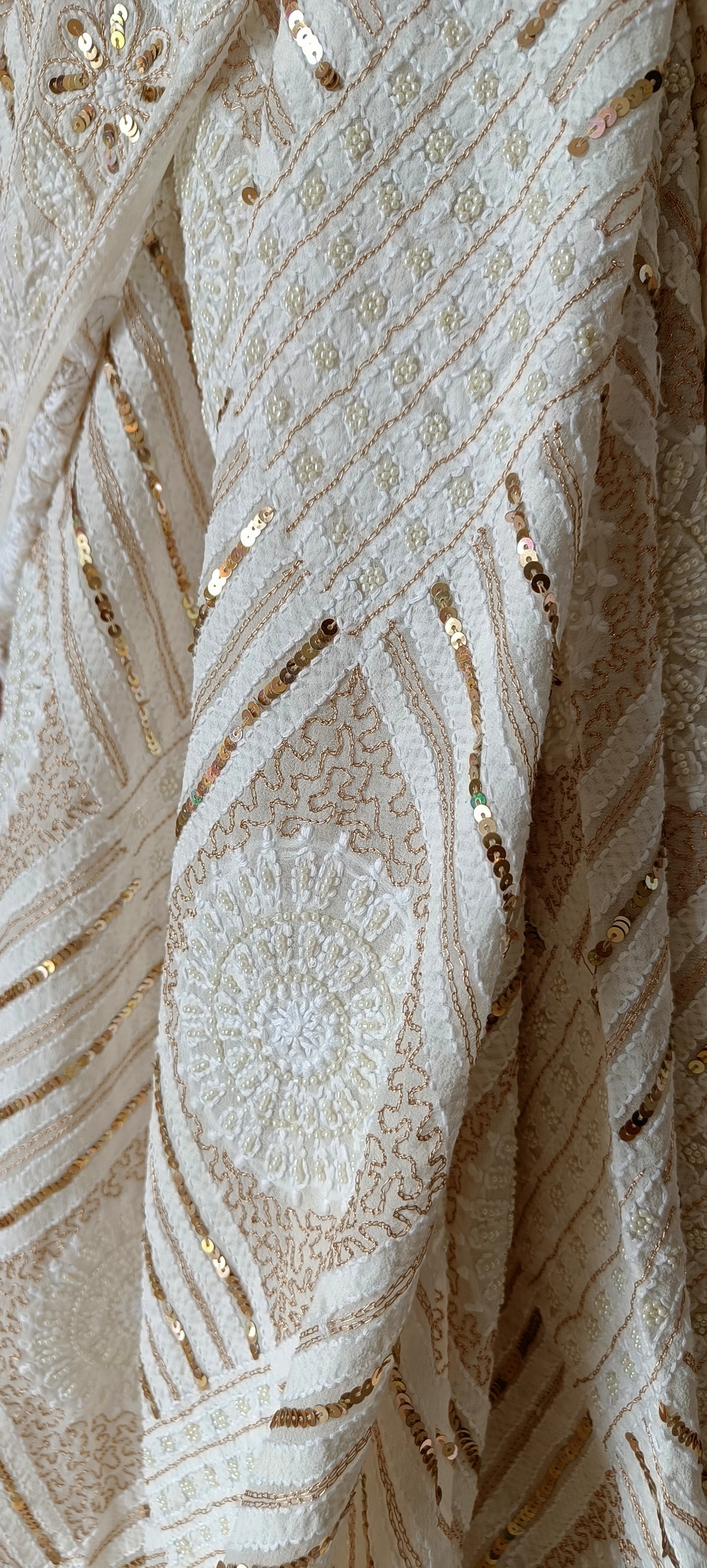Ruhani Ivory Chikankari Saree with heavy Sequins Pearl and Aari Embroidery