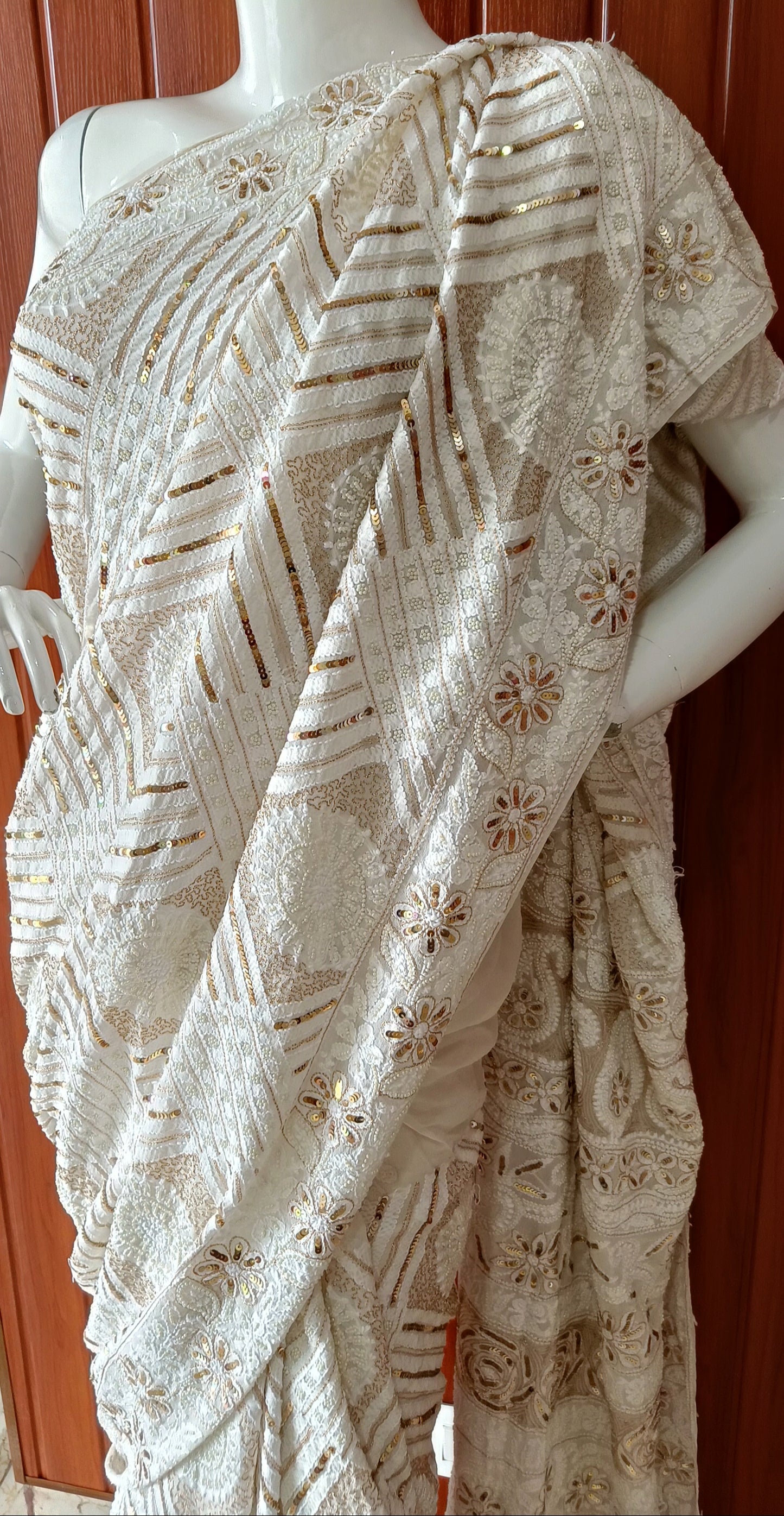 Ruhani Ivory Chikankari Saree with heavy Sequins Pearl and Aari Embroidery
