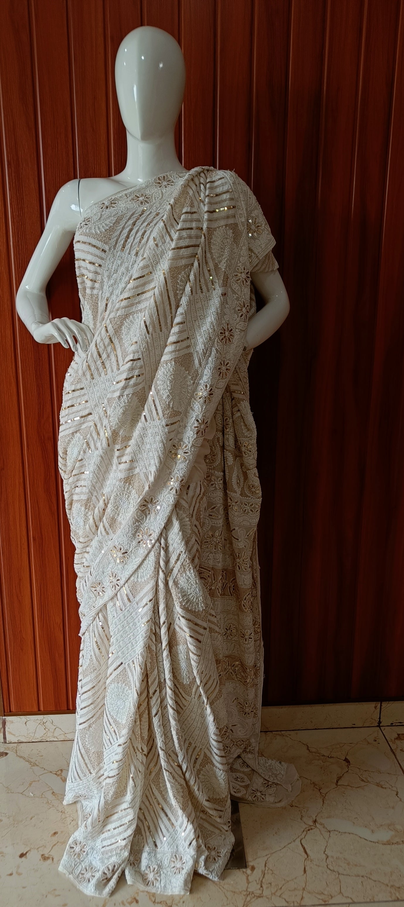 Ruhani Ivory Chikankari Saree with heavy Sequins Pearl and Aari Embroidery