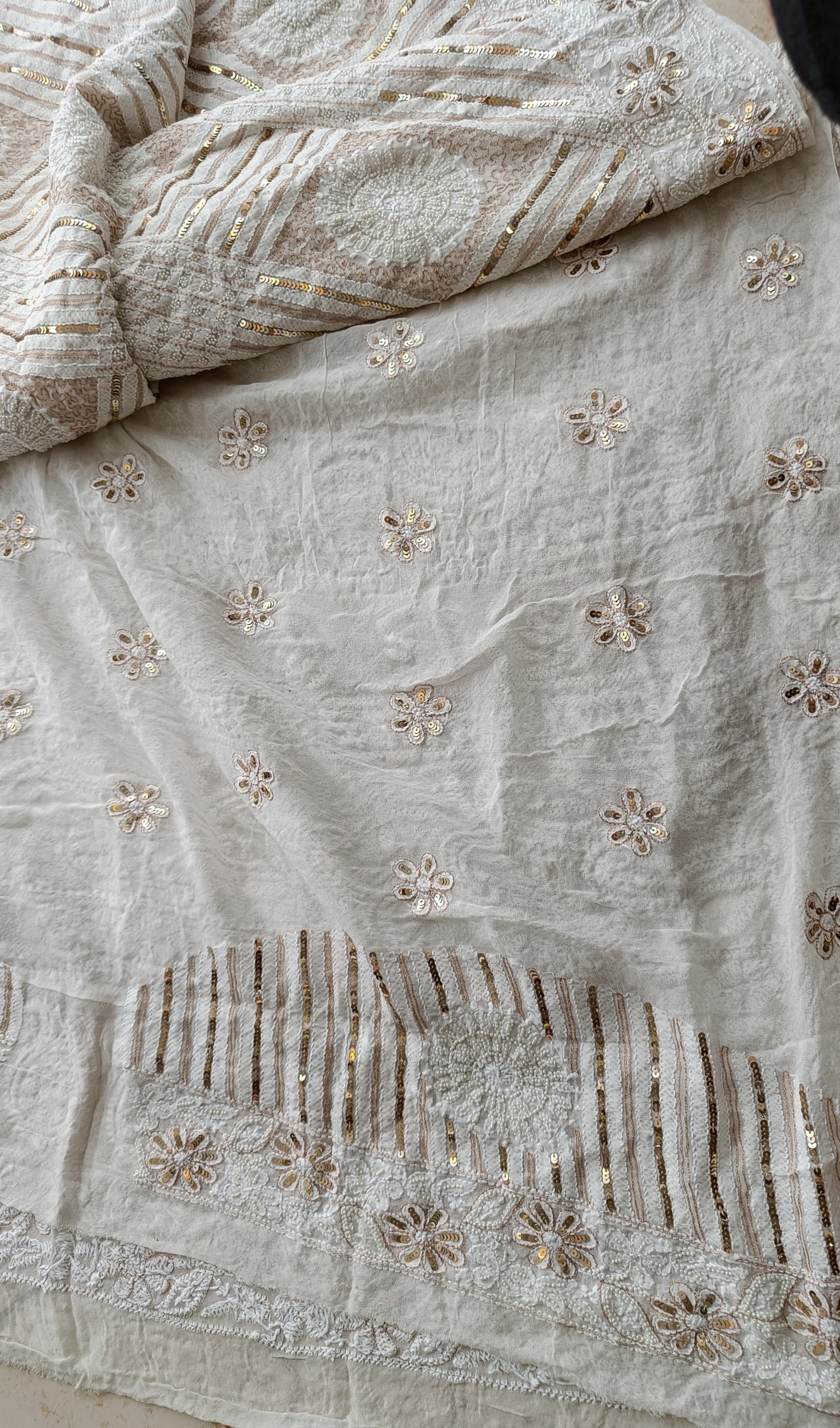 Ruhani Ivory Chikankari Saree with heavy Sequins Pearl and Aari Embroidery