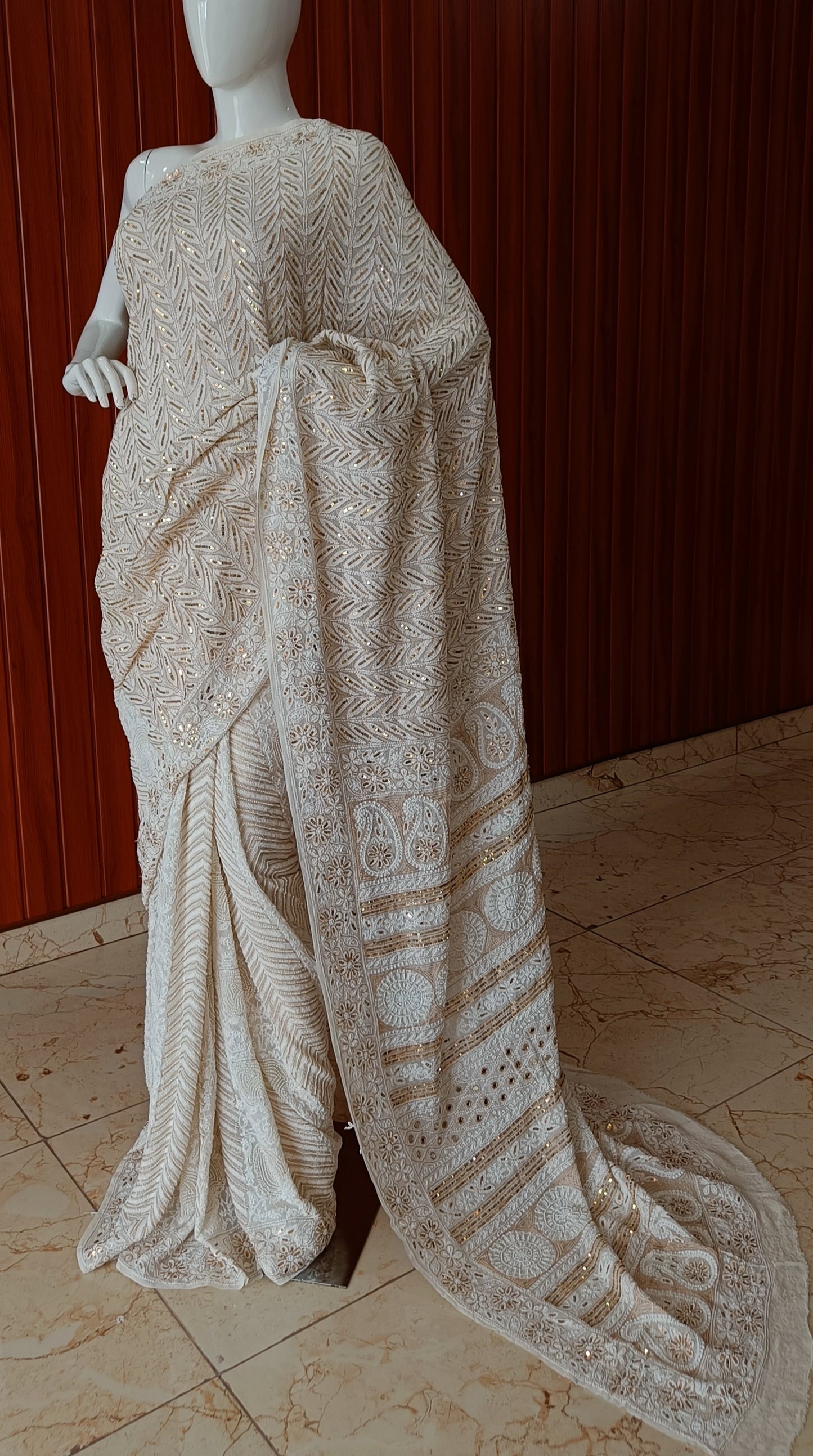 Ruhani Ivory Chikankari Saree with heavy Sequins Pearl and Aari Embroidery