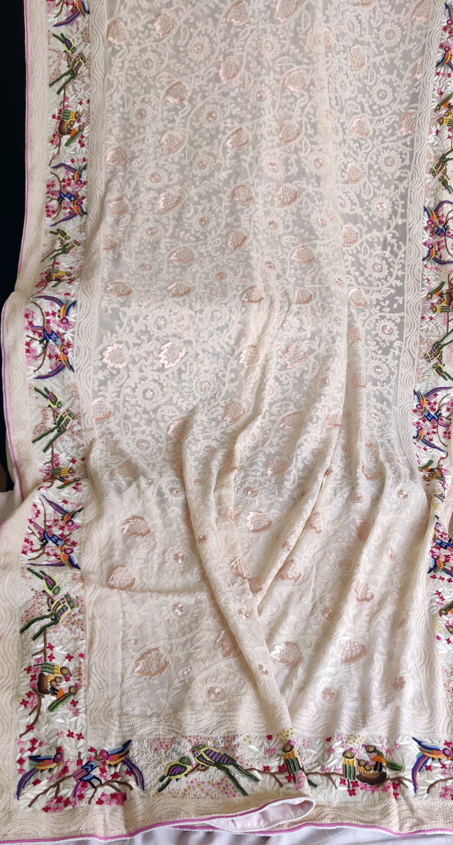 Nude Pink Pure Georgette saree with allover shadow work and masterpiece french knot hand embroidery